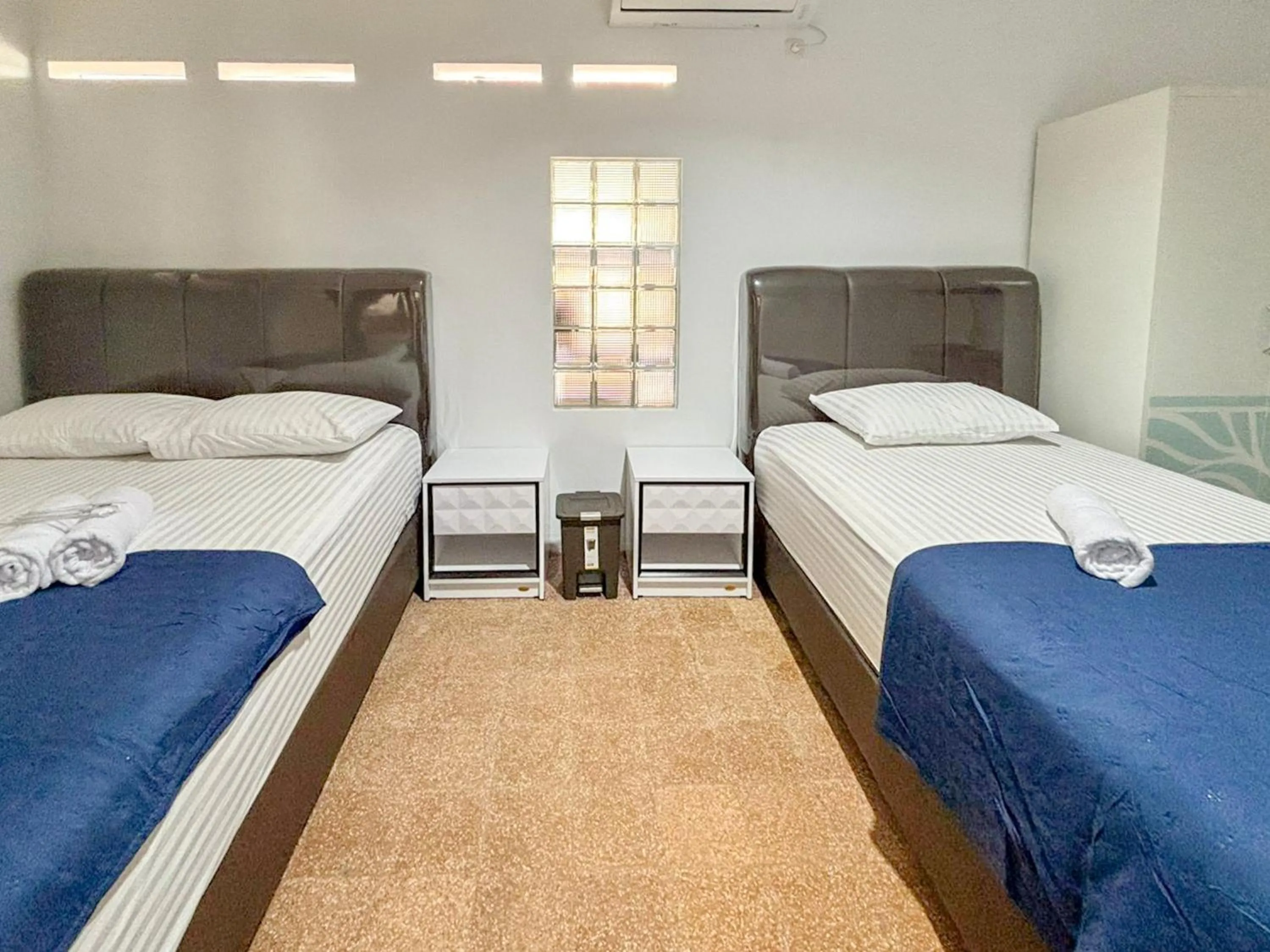 Bedroom, Bed in Tini's Guest House Malang Mitra RedDoorz