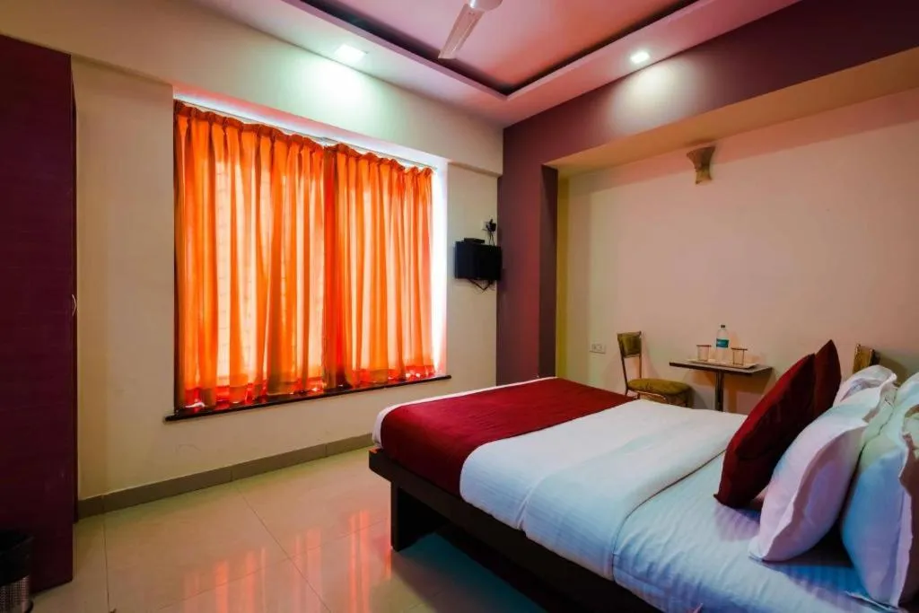 Photo of the whole room, Bed in HOTEL GOLDEN PLAZA