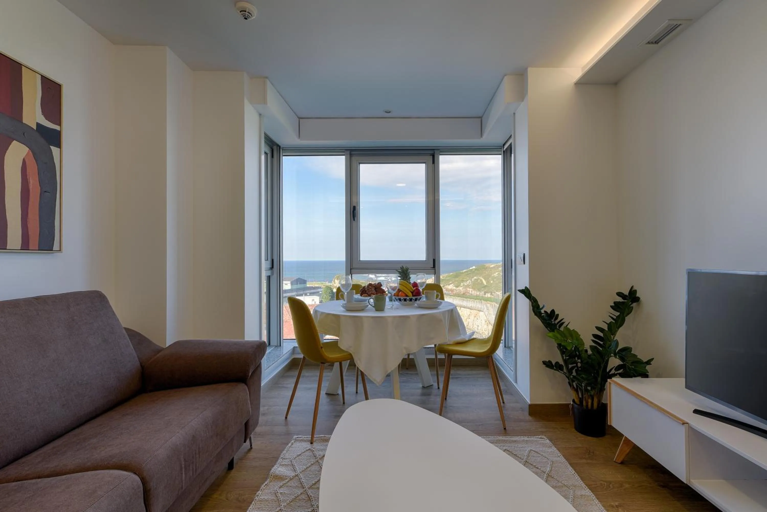 Living room in TH Apartments by Como en Casa