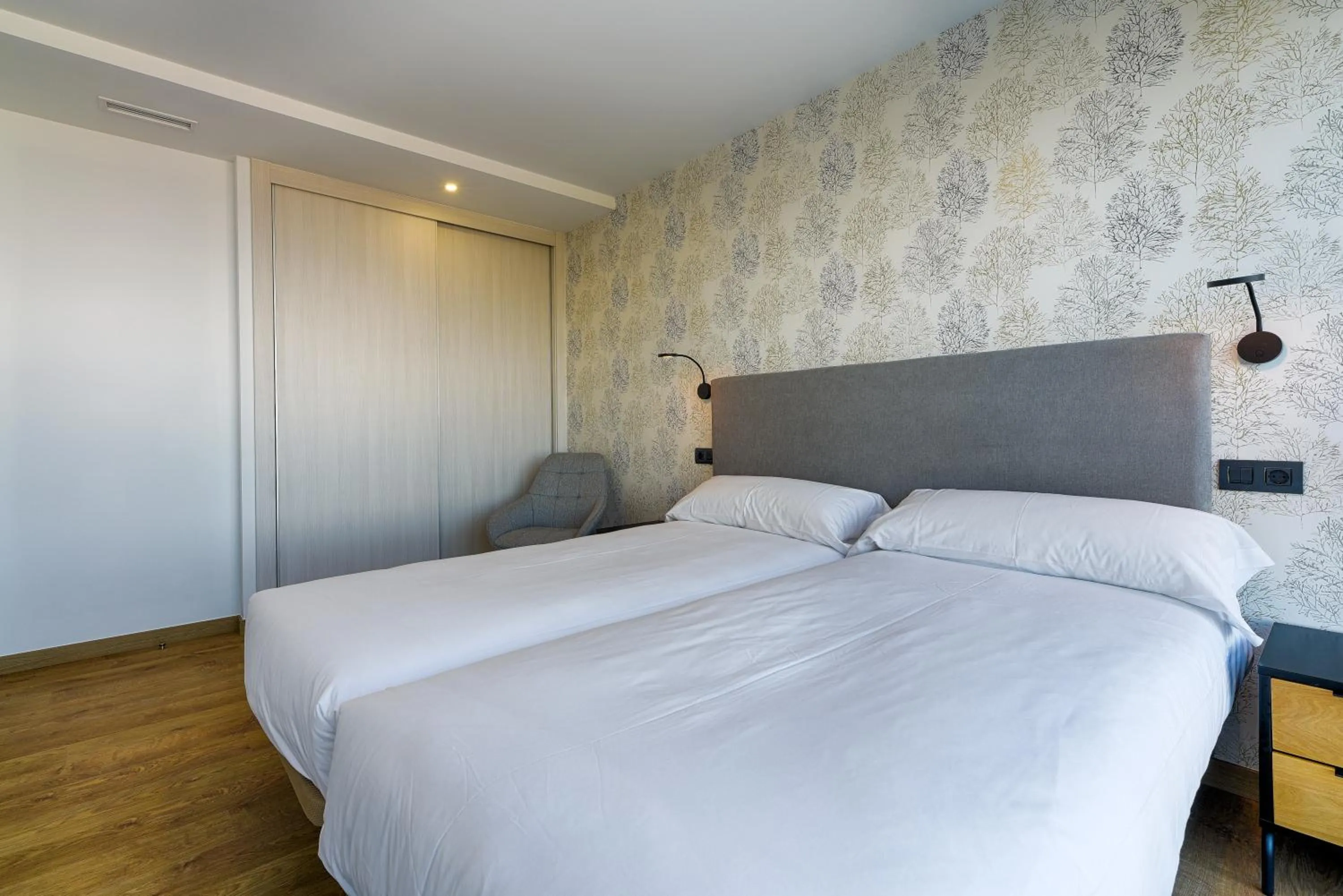 Bed in TH Apartments by Como en Casa