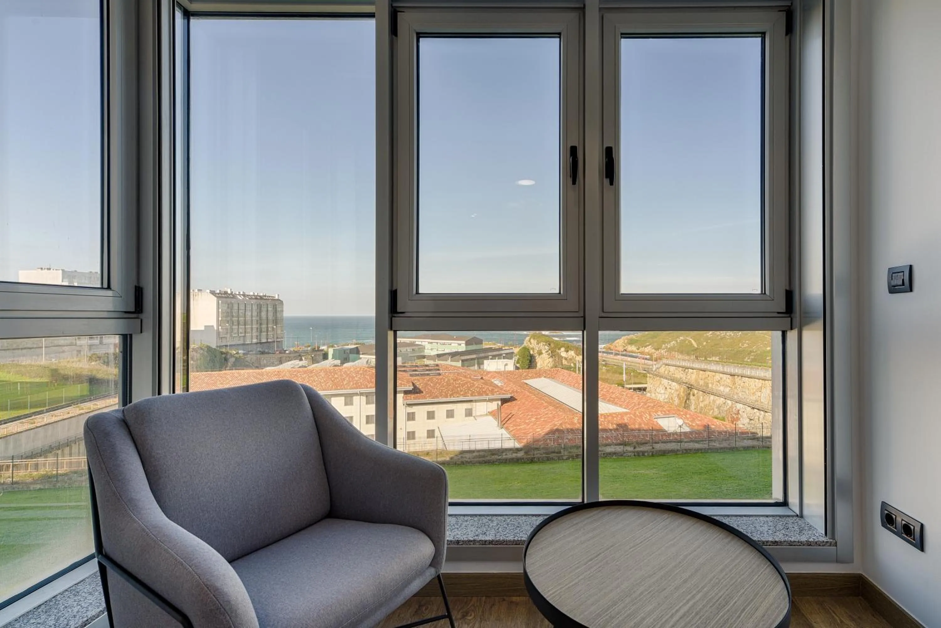 Living room in TH Apartments by Como en Casa