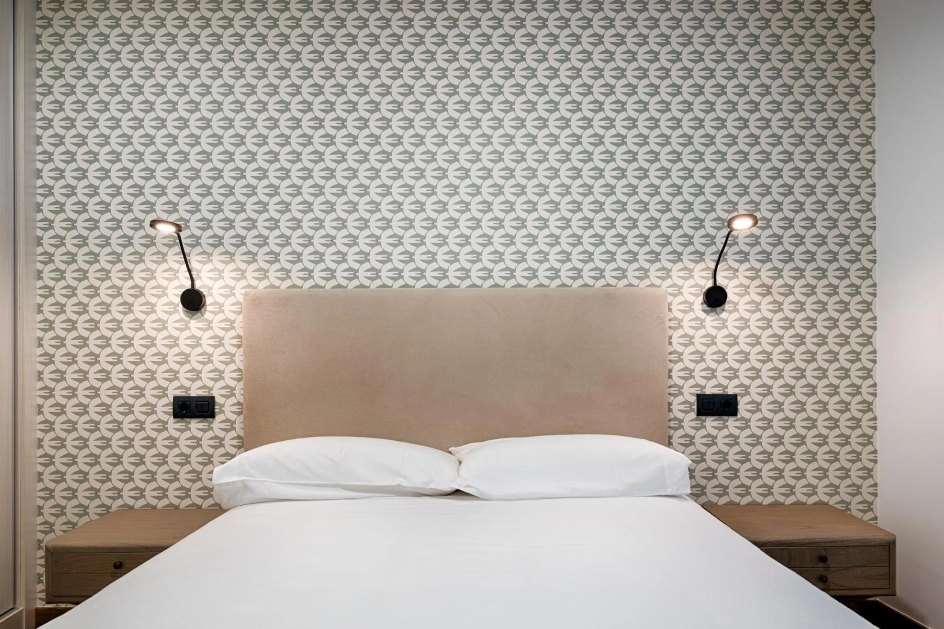 Bed in TH Apartments by Como en Casa