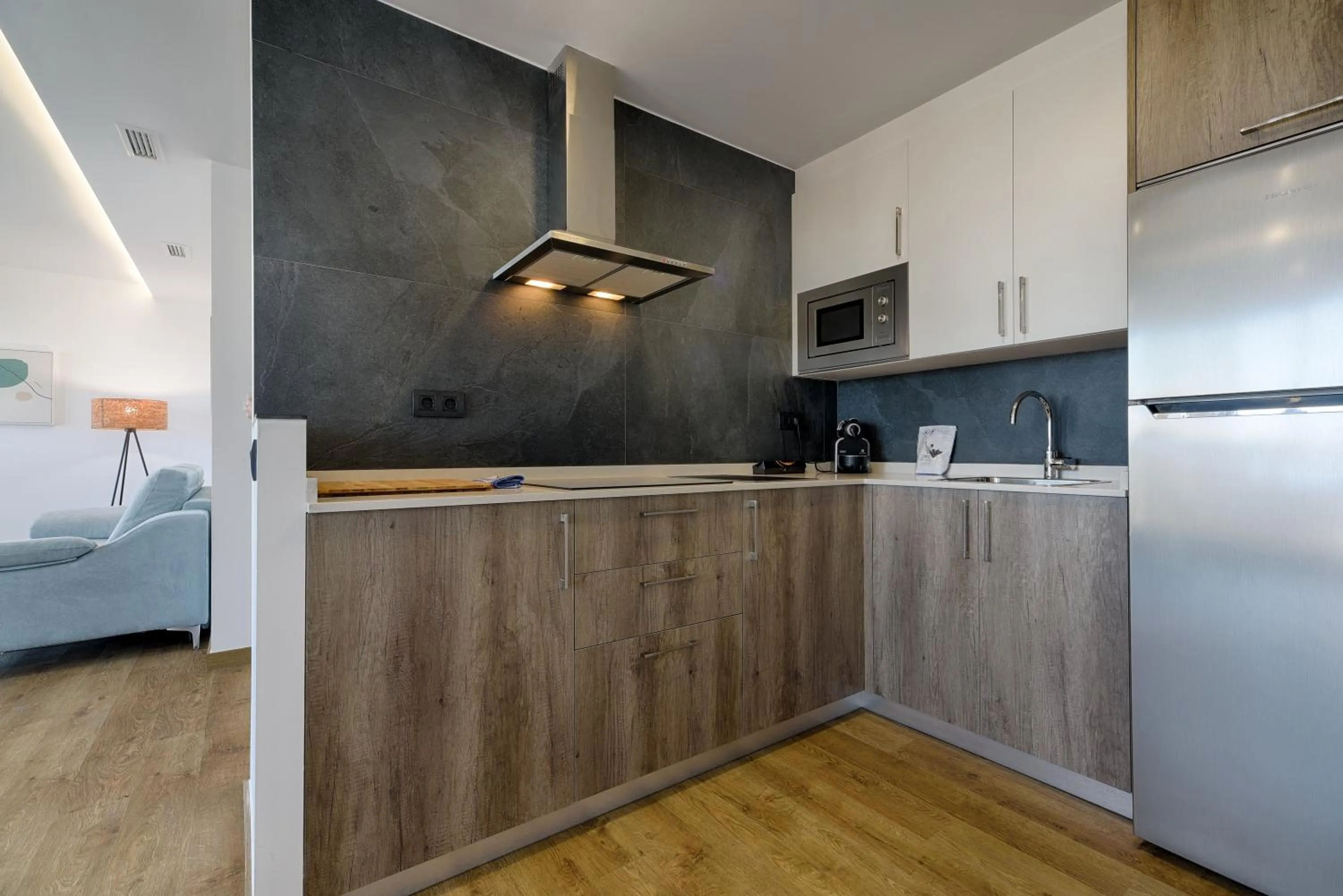 Kitchen or kitchenette in TH Apartments by Como en Casa