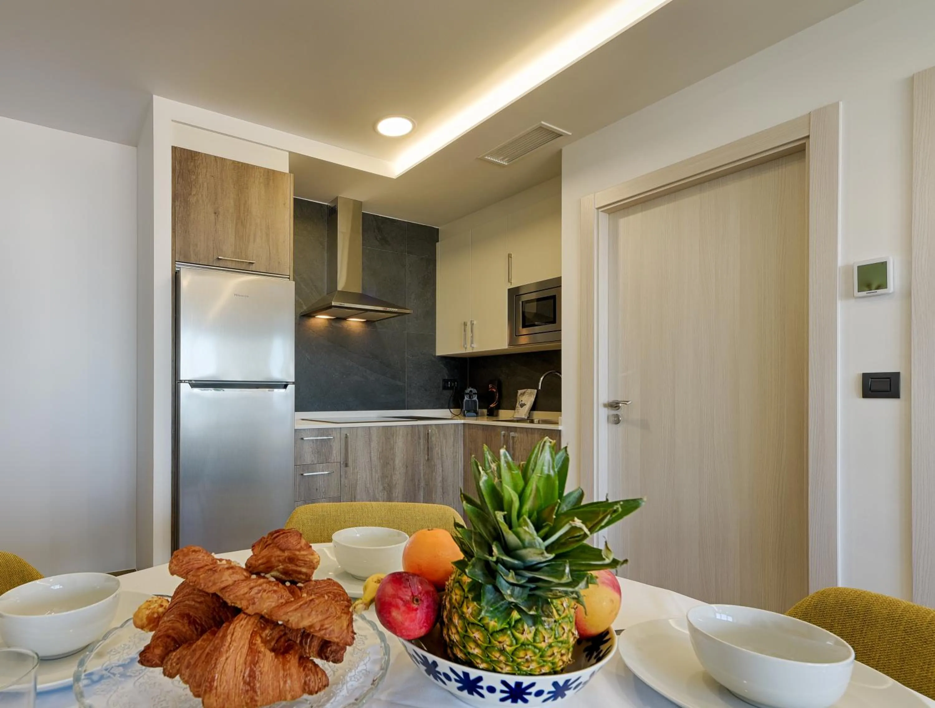 Kitchen or kitchenette in TH Apartments by Como en Casa