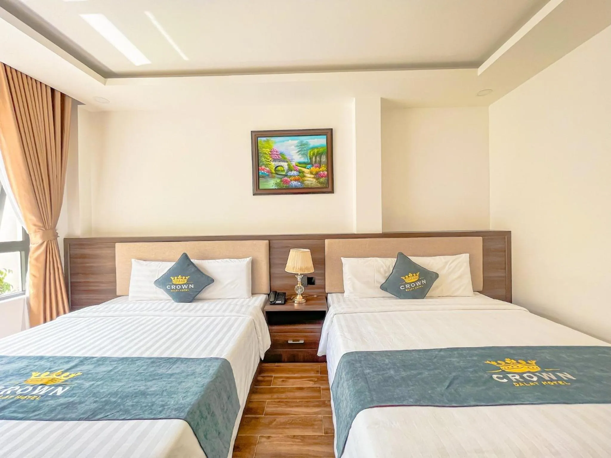 Bed in Crown Dalat Hotel