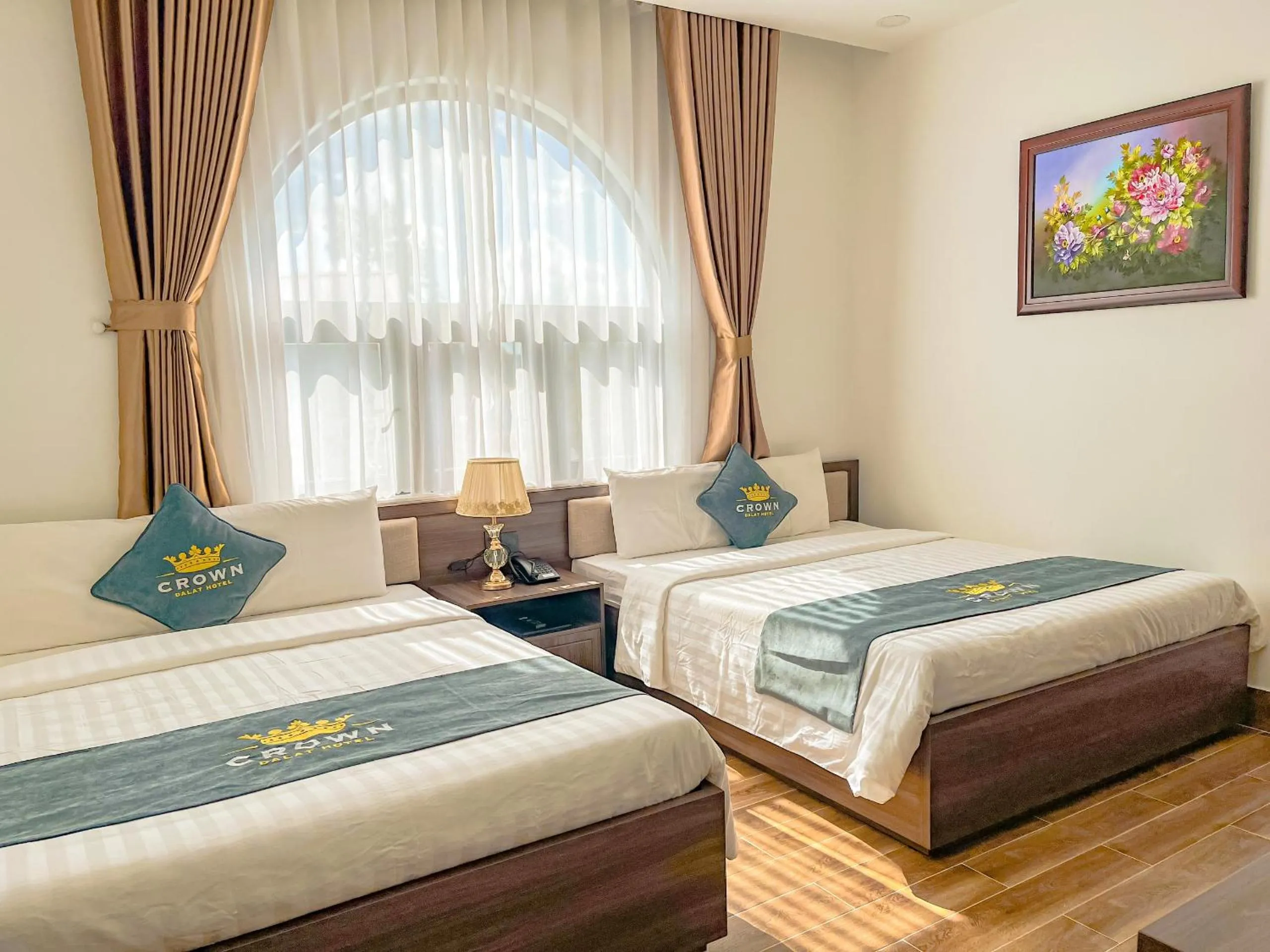 Bed in Crown Dalat Hotel