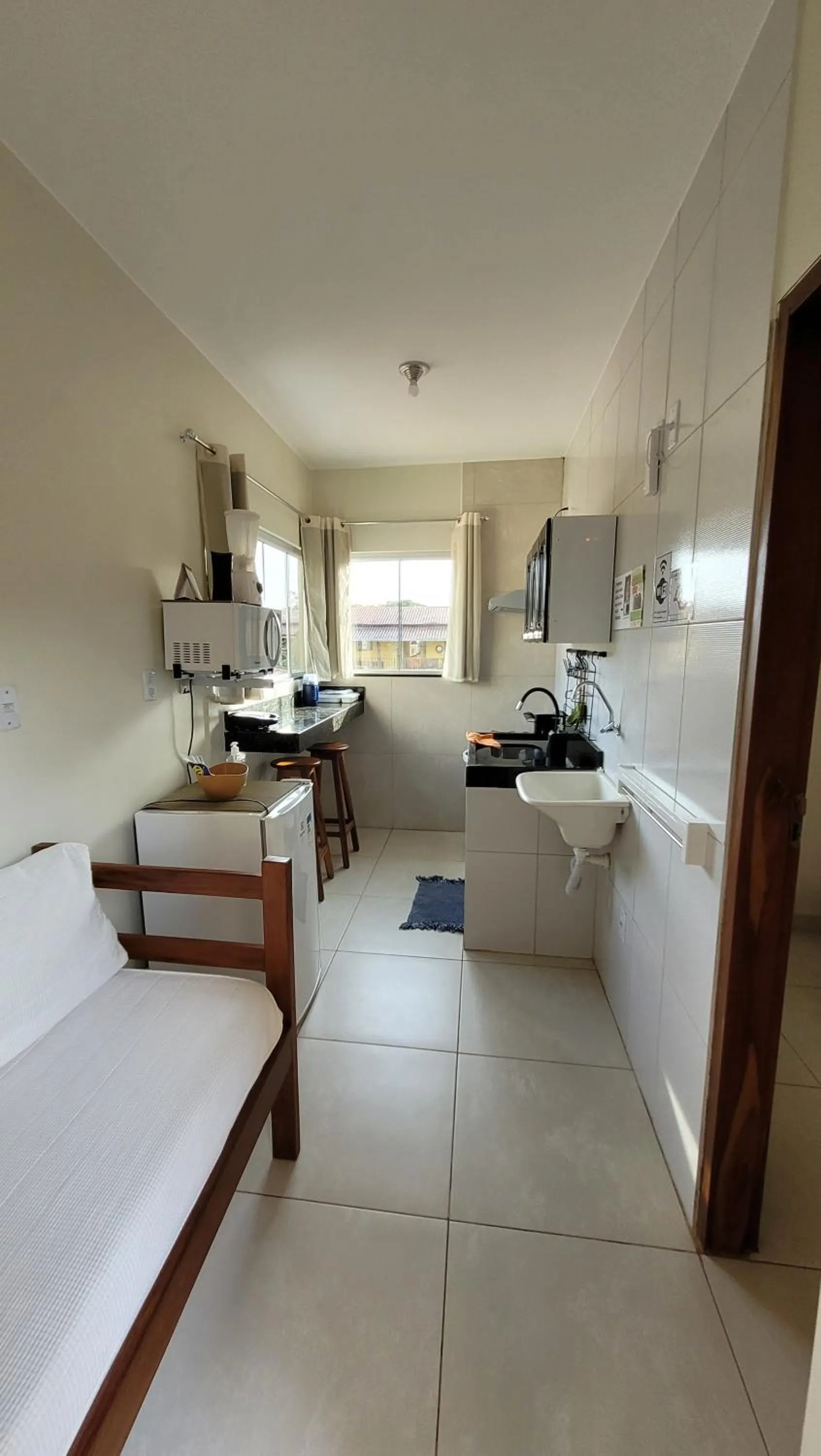 Communal kitchen, Bed in Village São Jorge - Guest Apartment