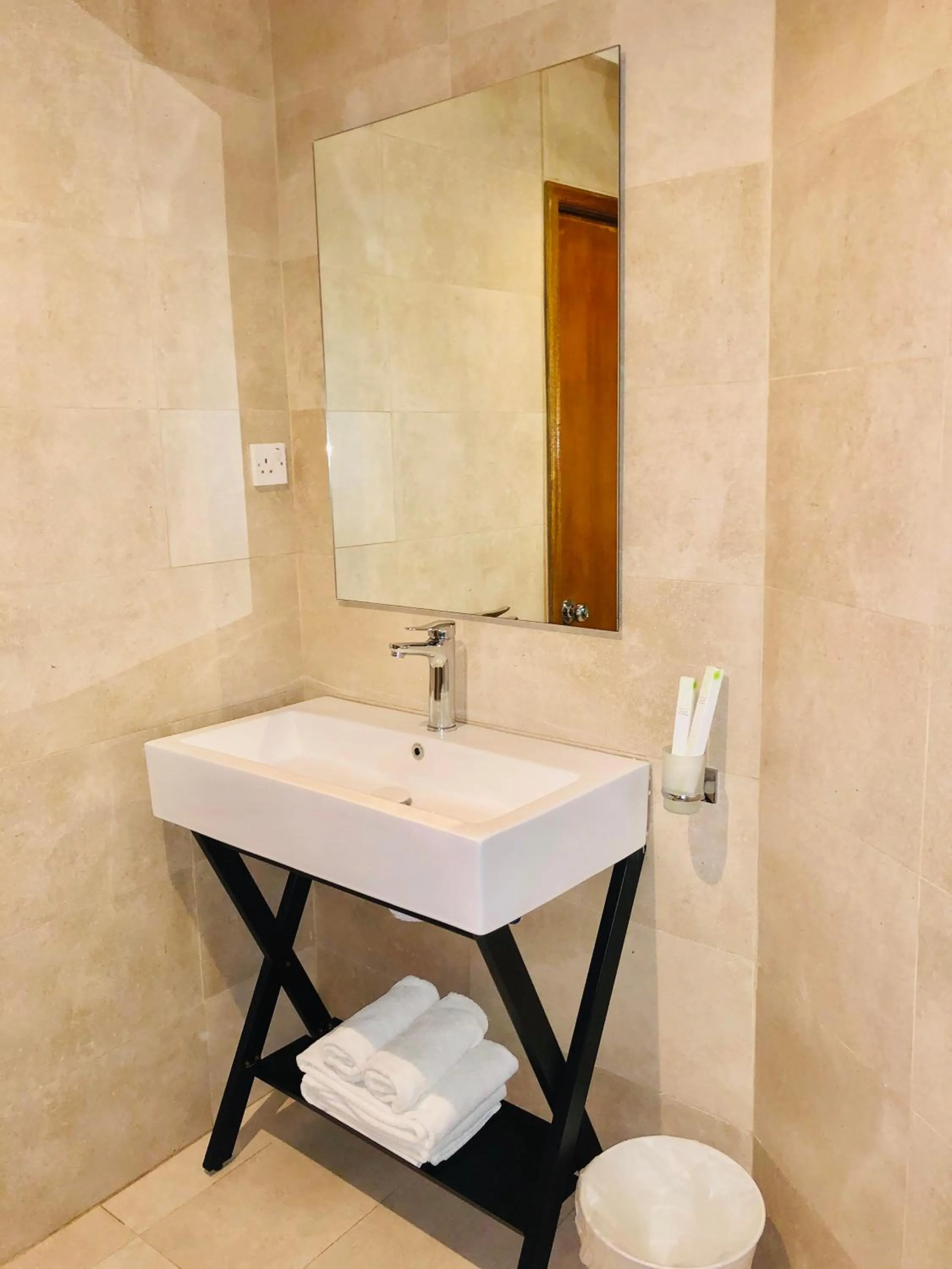 Bathroom in Times Square Suite Hotel