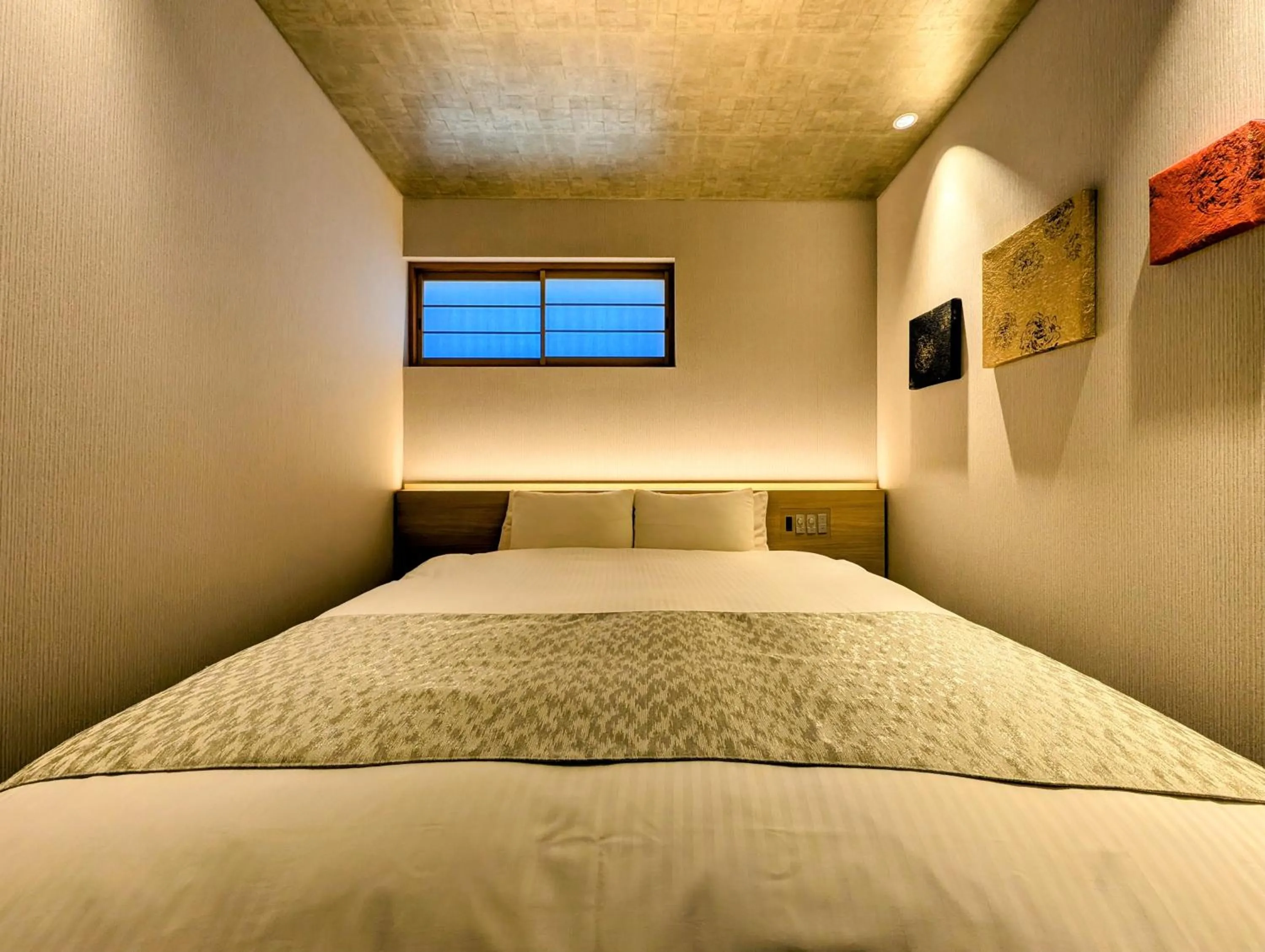 Bed in ひがし茶屋街らしく金沢 Hotel Rashiku kanazawa