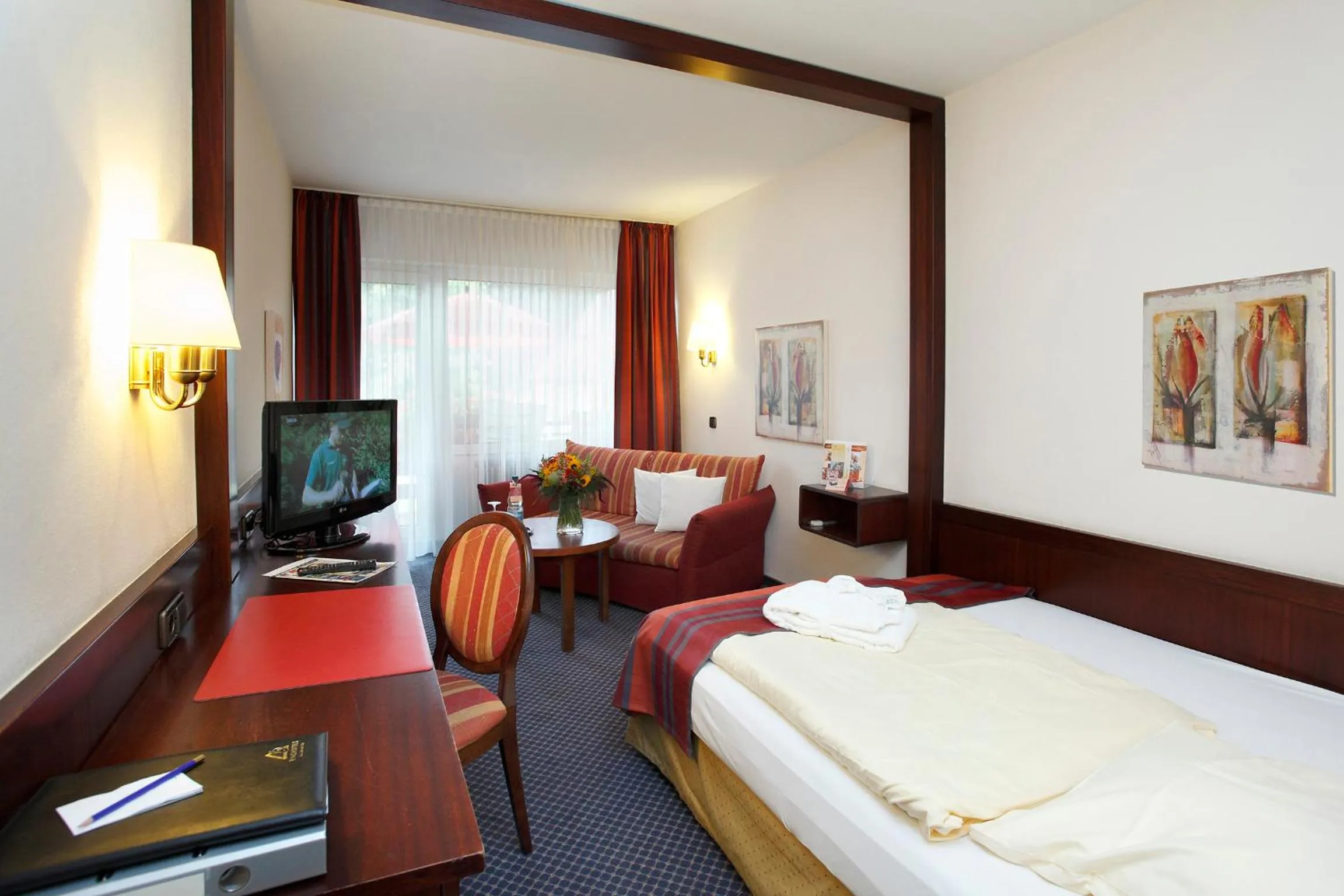 Photo of the whole room, Bed in Posthotel Usseln