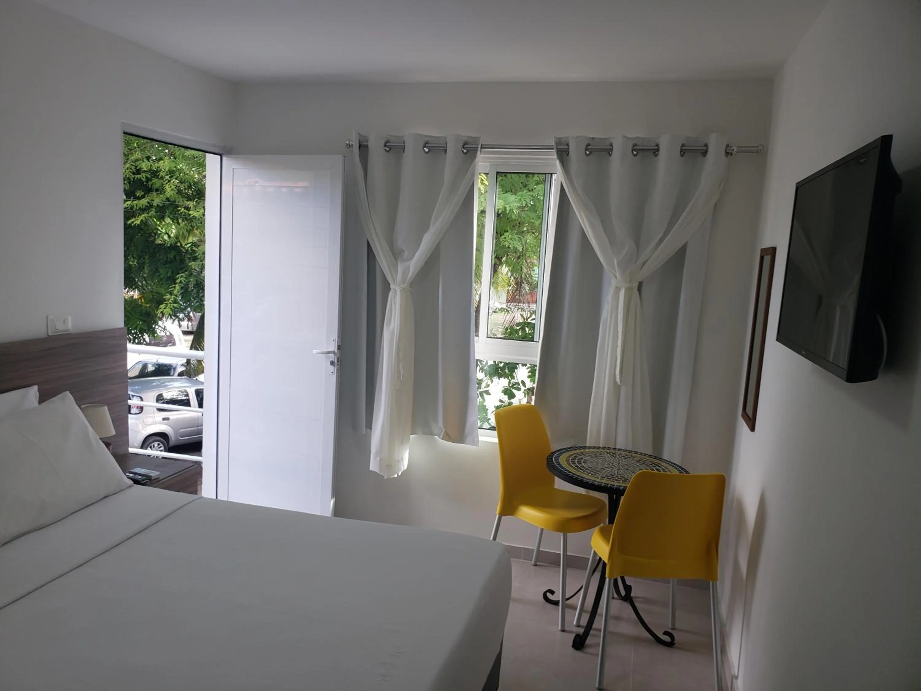 Photo of the whole room, Bed in Flats Angatu Porto de Galinhas PE