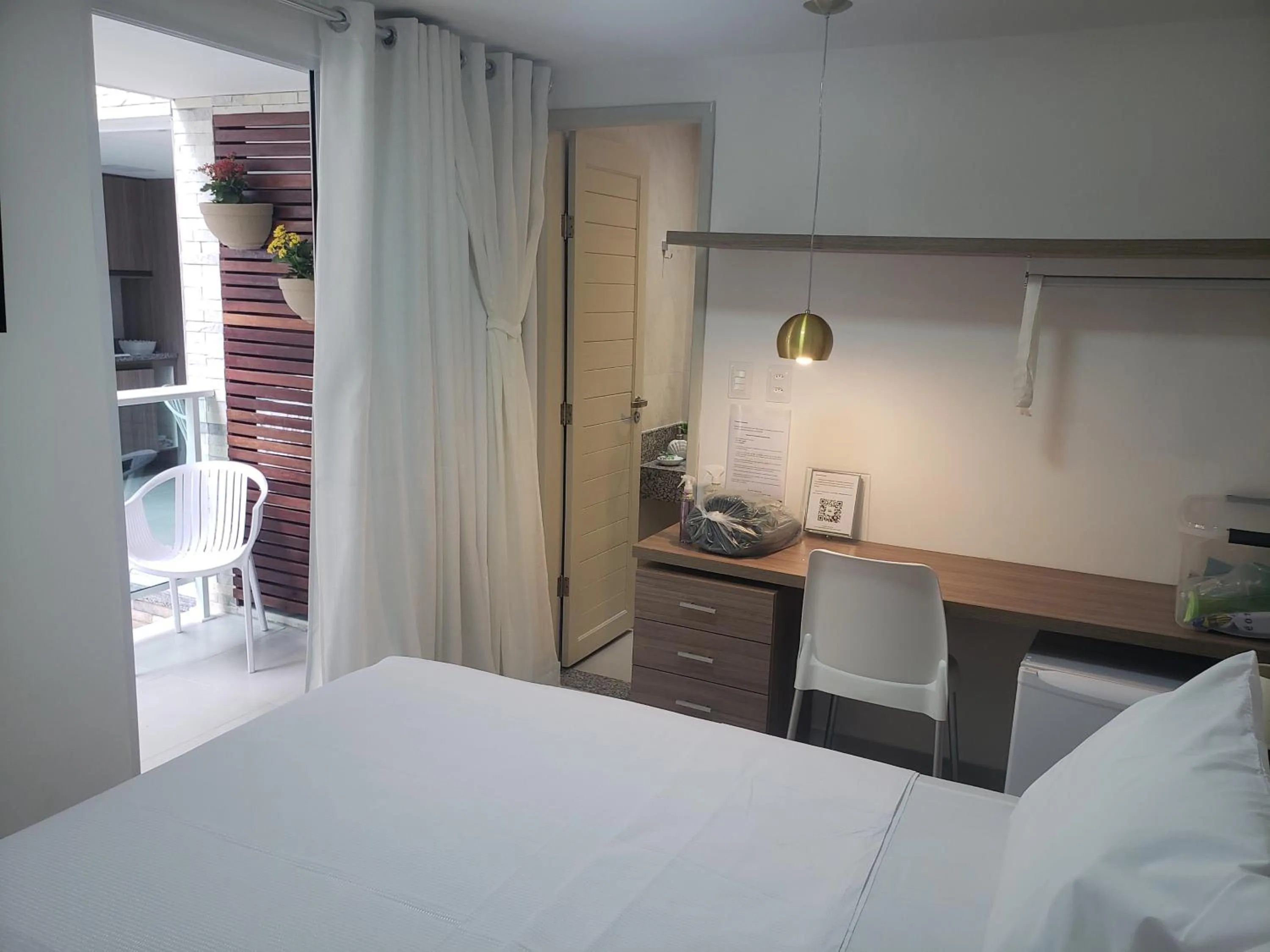 Photo of the whole room, Bed in Flats Angatu Porto de Galinhas PE