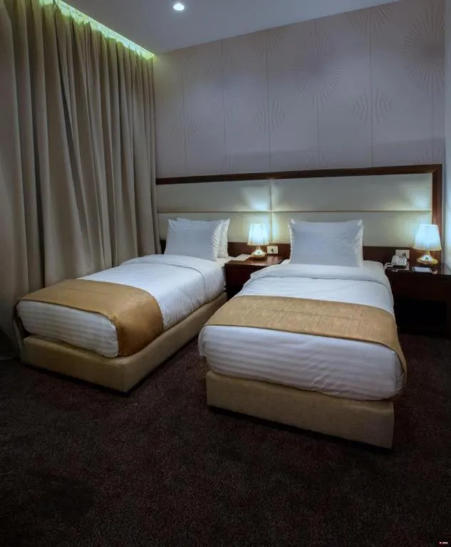 Bed in Seas Hotel Amman