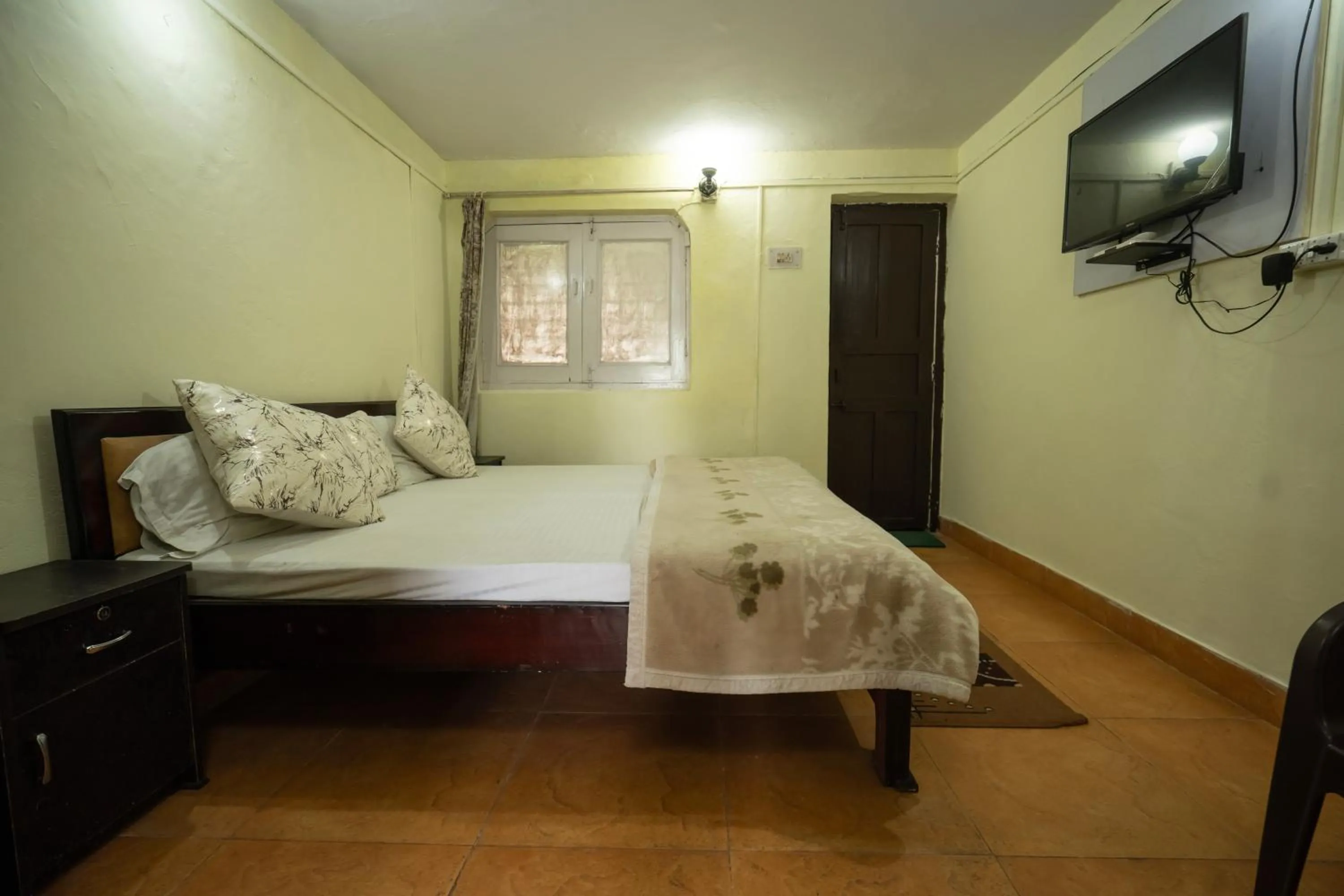 Bed in The Golden Sunrise Hotel