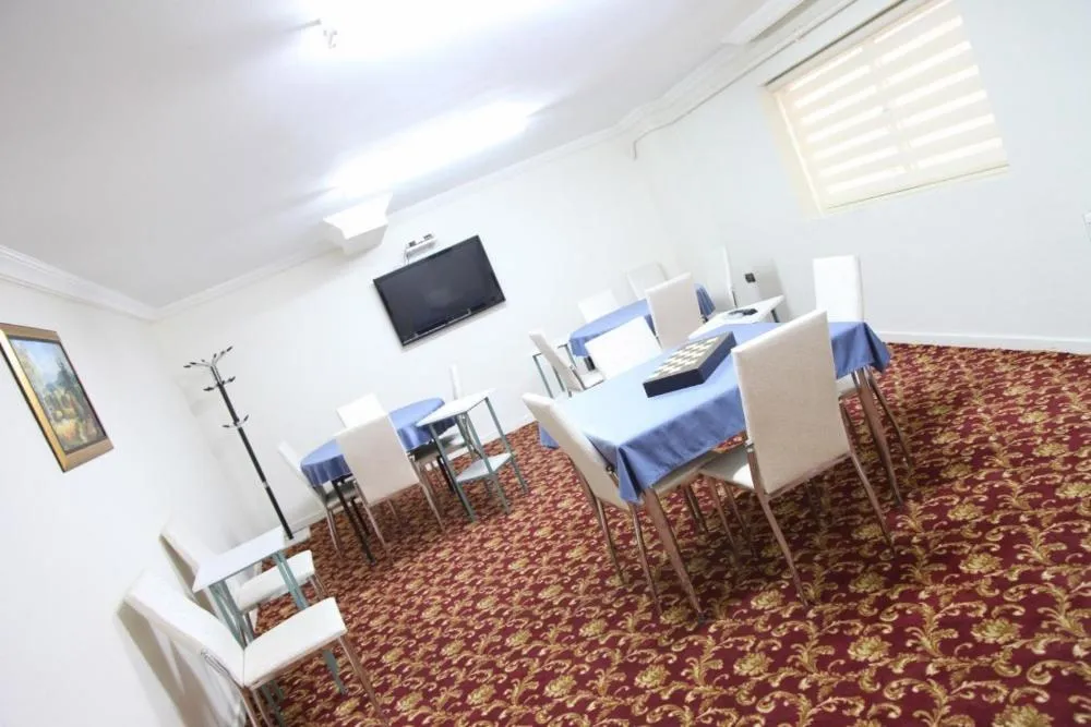 Communal lounge/ TV room in Hattuşirin Hotel