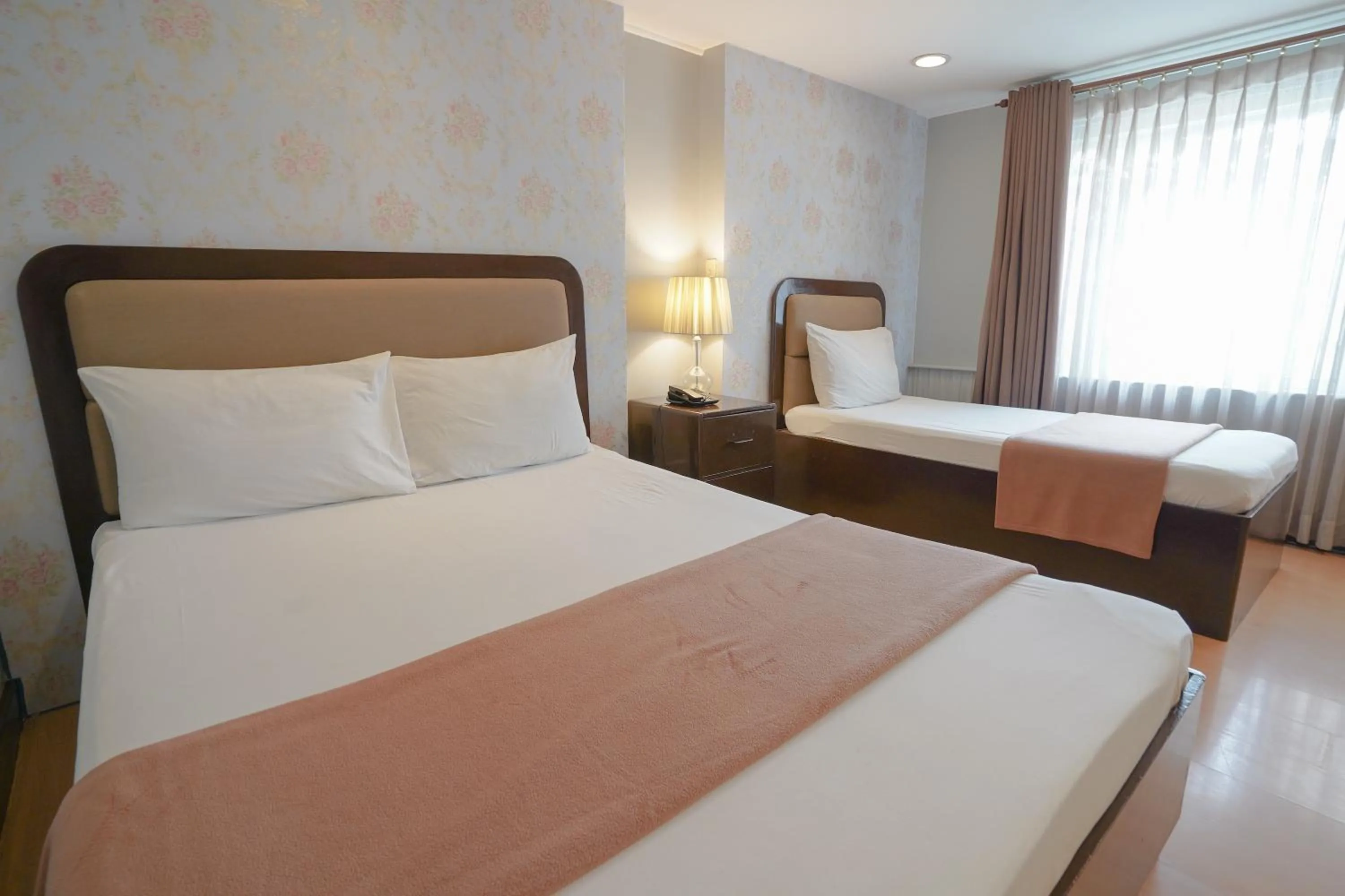 Bed in Arzo Hotel Manila