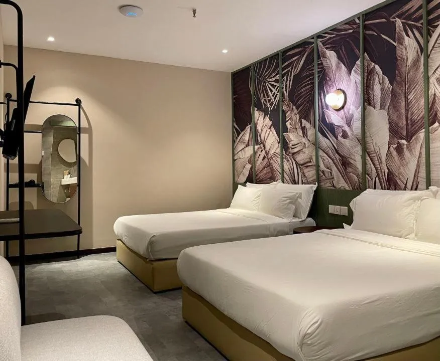 Photo of the whole room, Bed in Harper Boutique Hotel at Sutera Avenue
