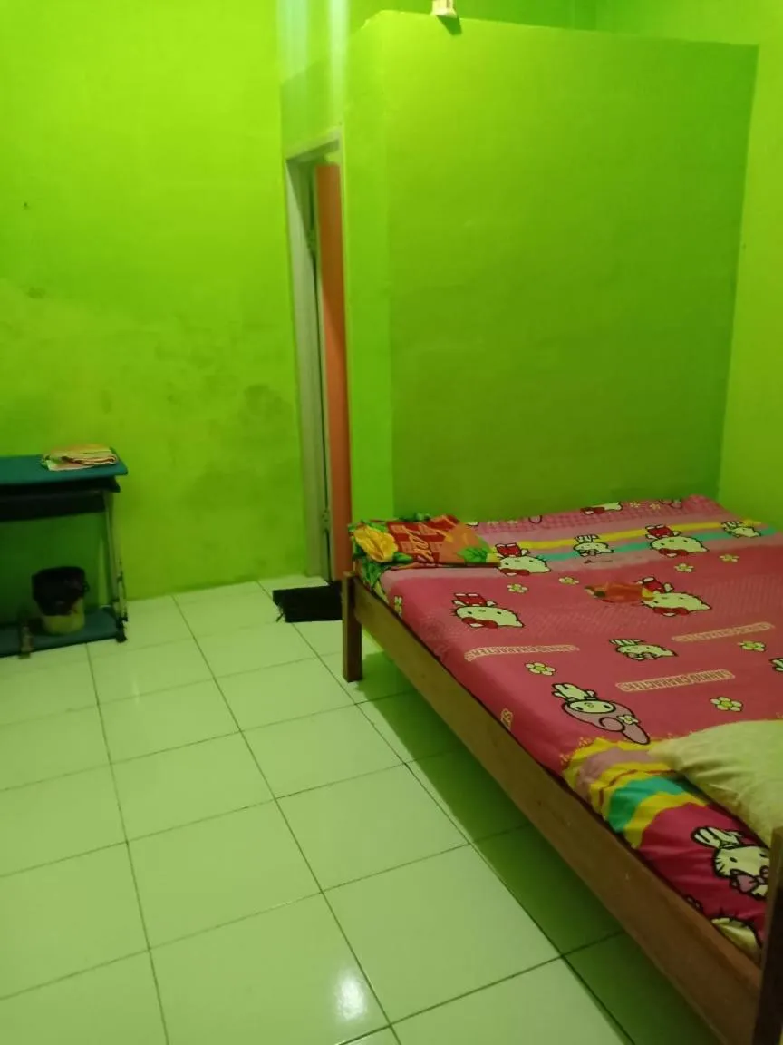 Bedroom in Penginapan Dinafizka