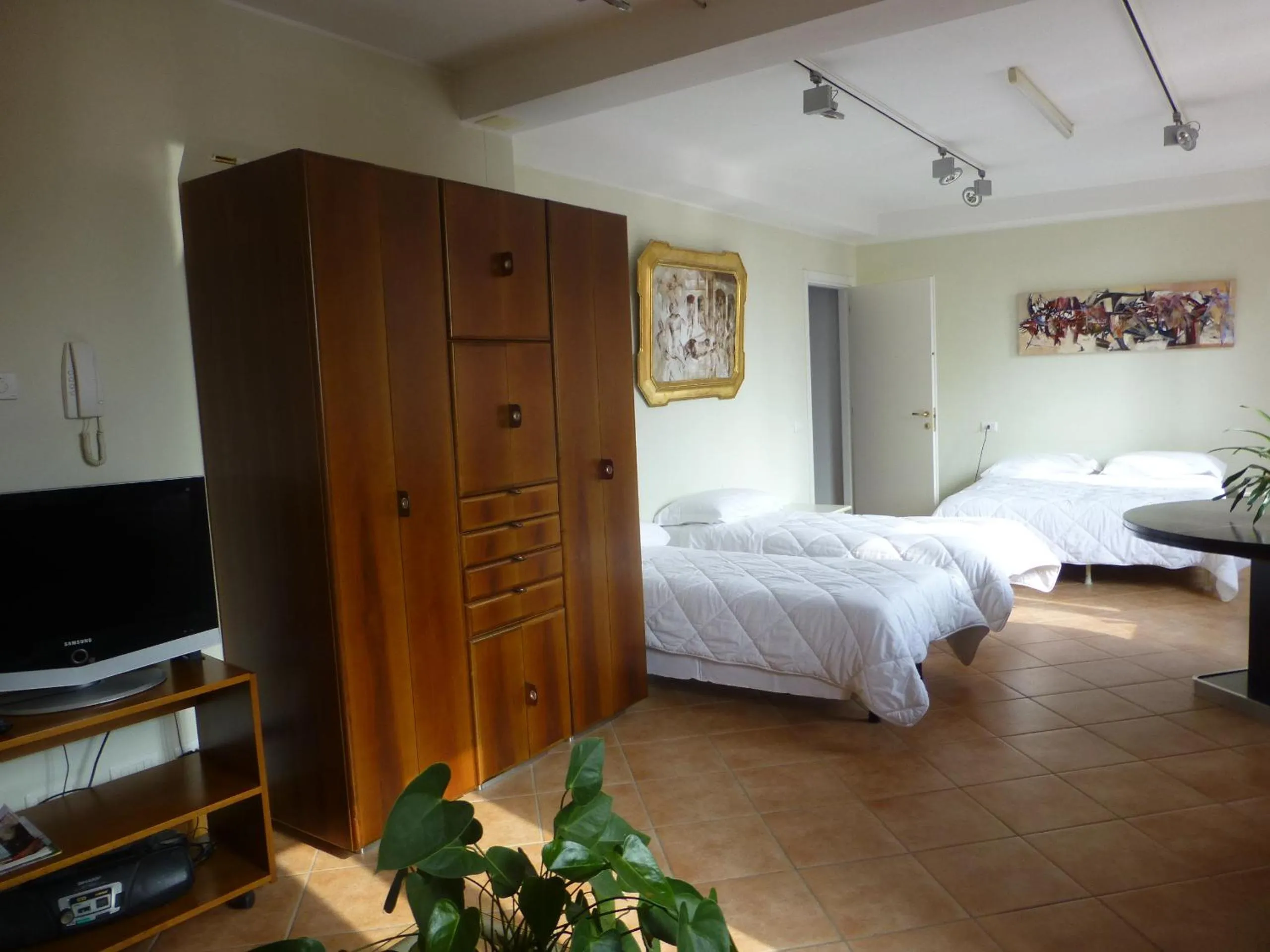 Photo of the whole room, Bed in Caffè del Viaggiatore