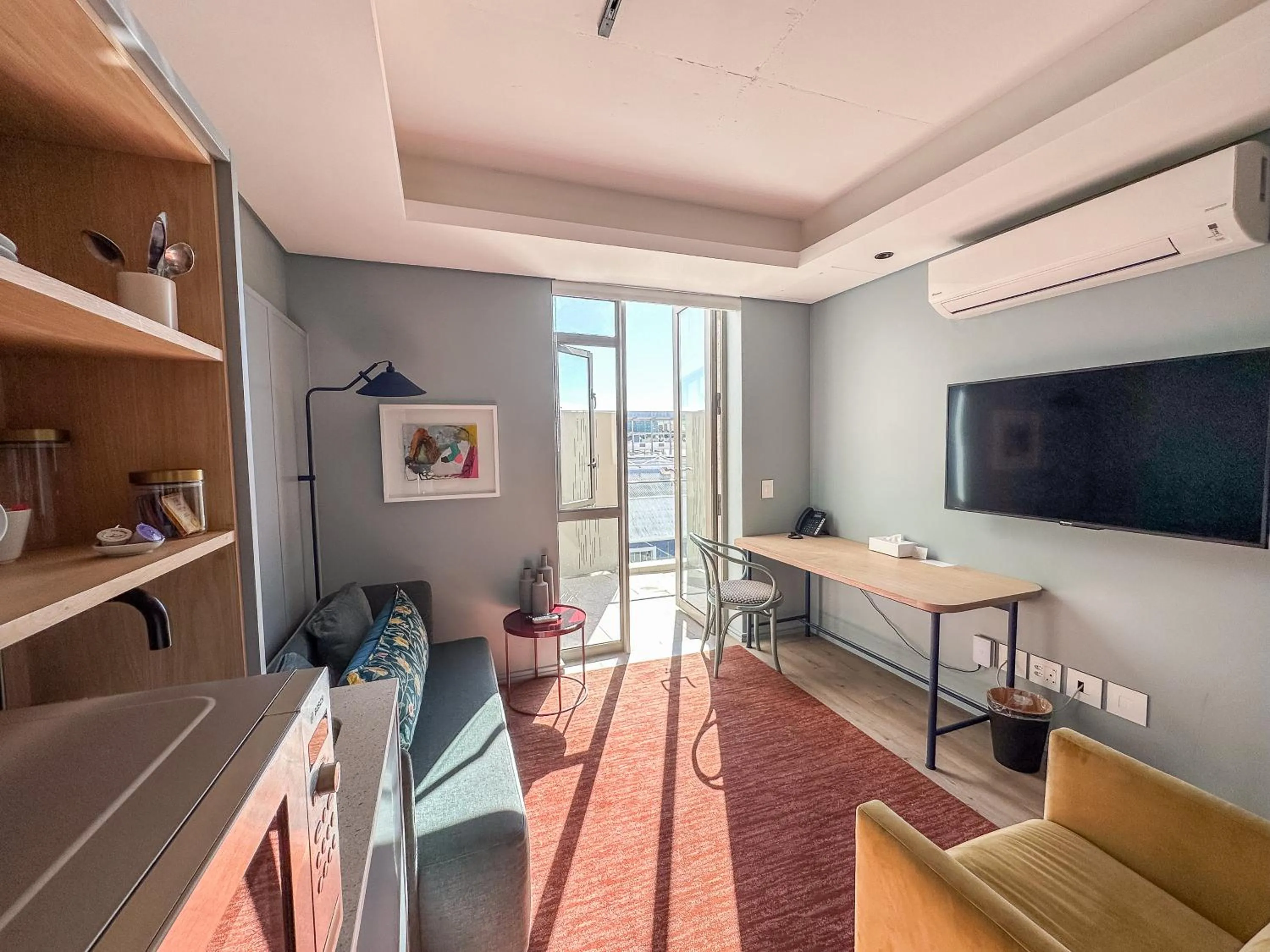 Seating area in Home Suite Hotels De Waterkant