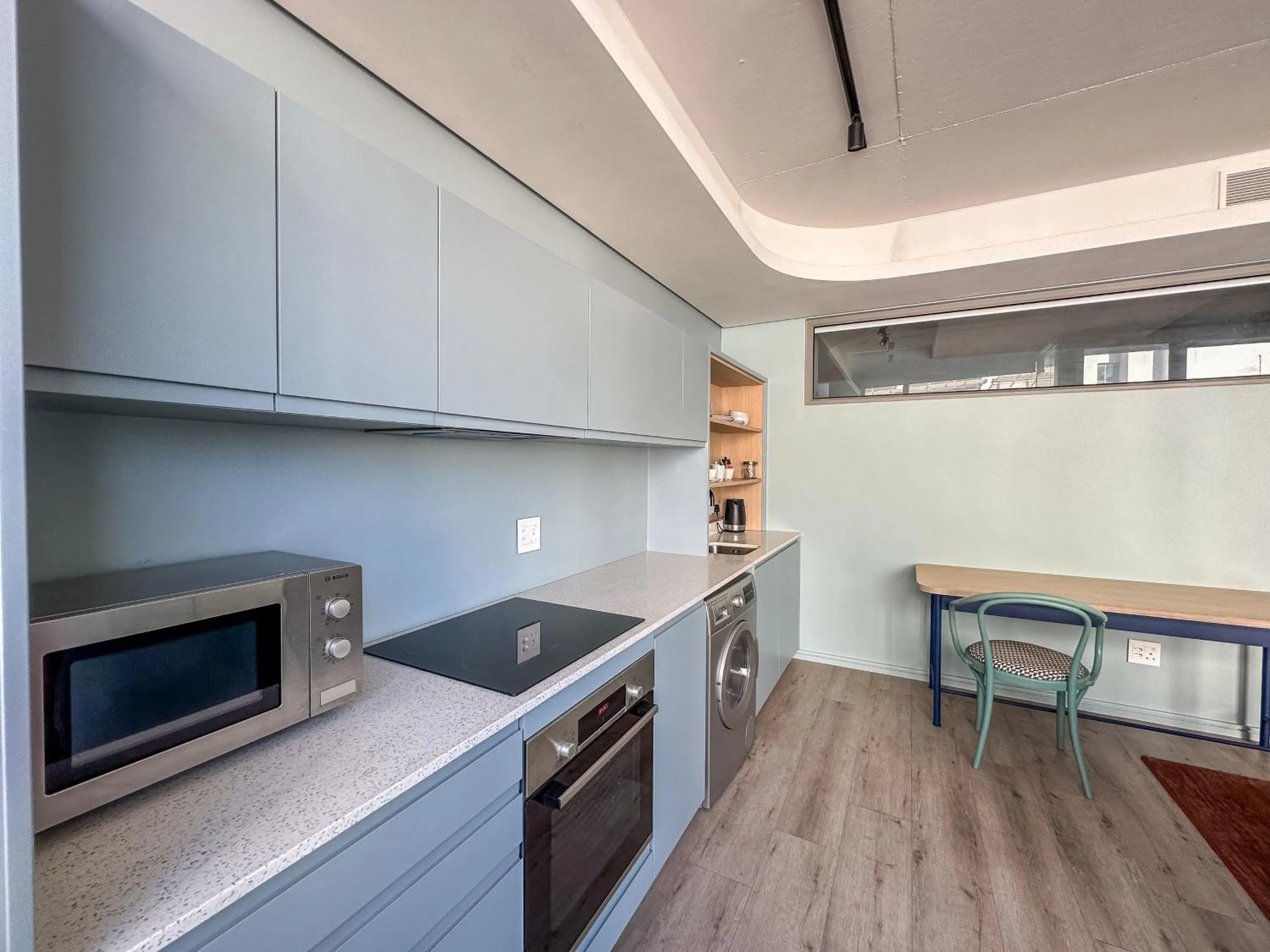 Kitchen or kitchenette in Home Suite Hotels De Waterkant