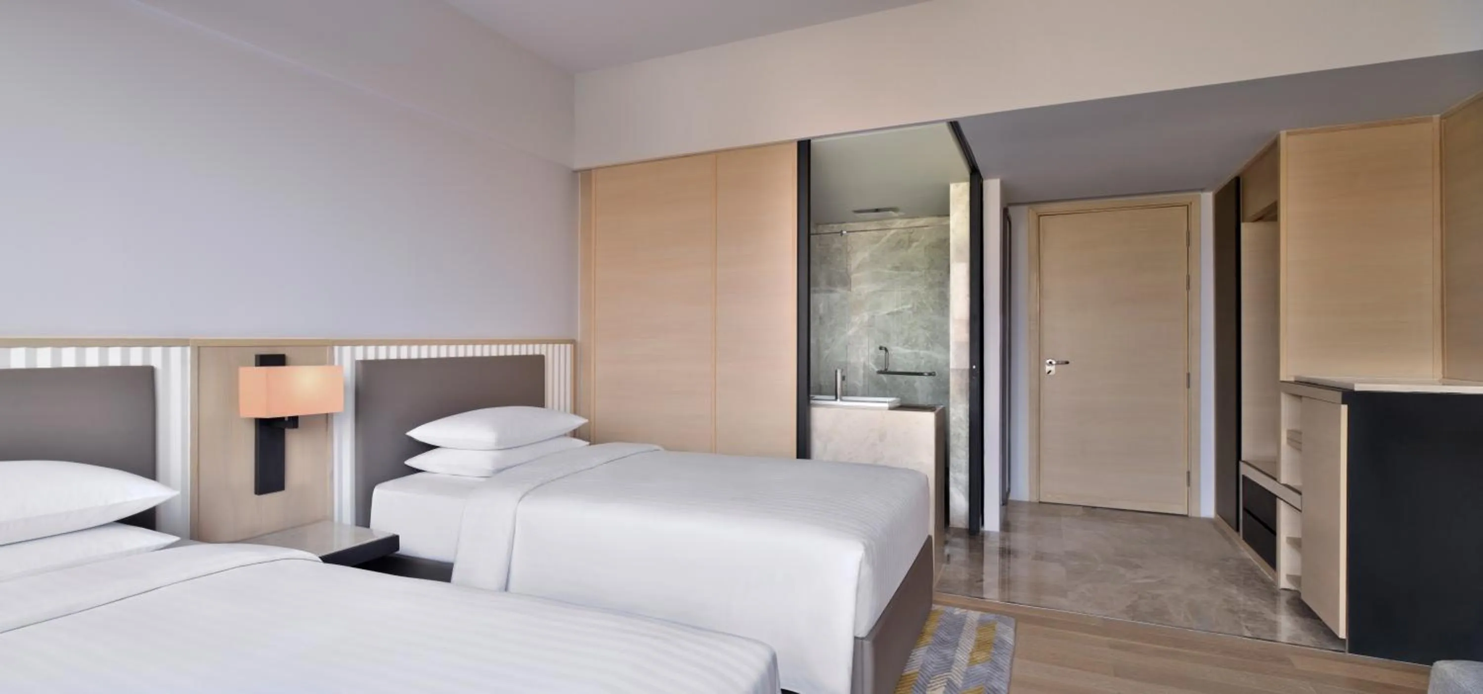 Bed in Courtyard by Marriott Ahmedabad Sindhu Bhavan Road