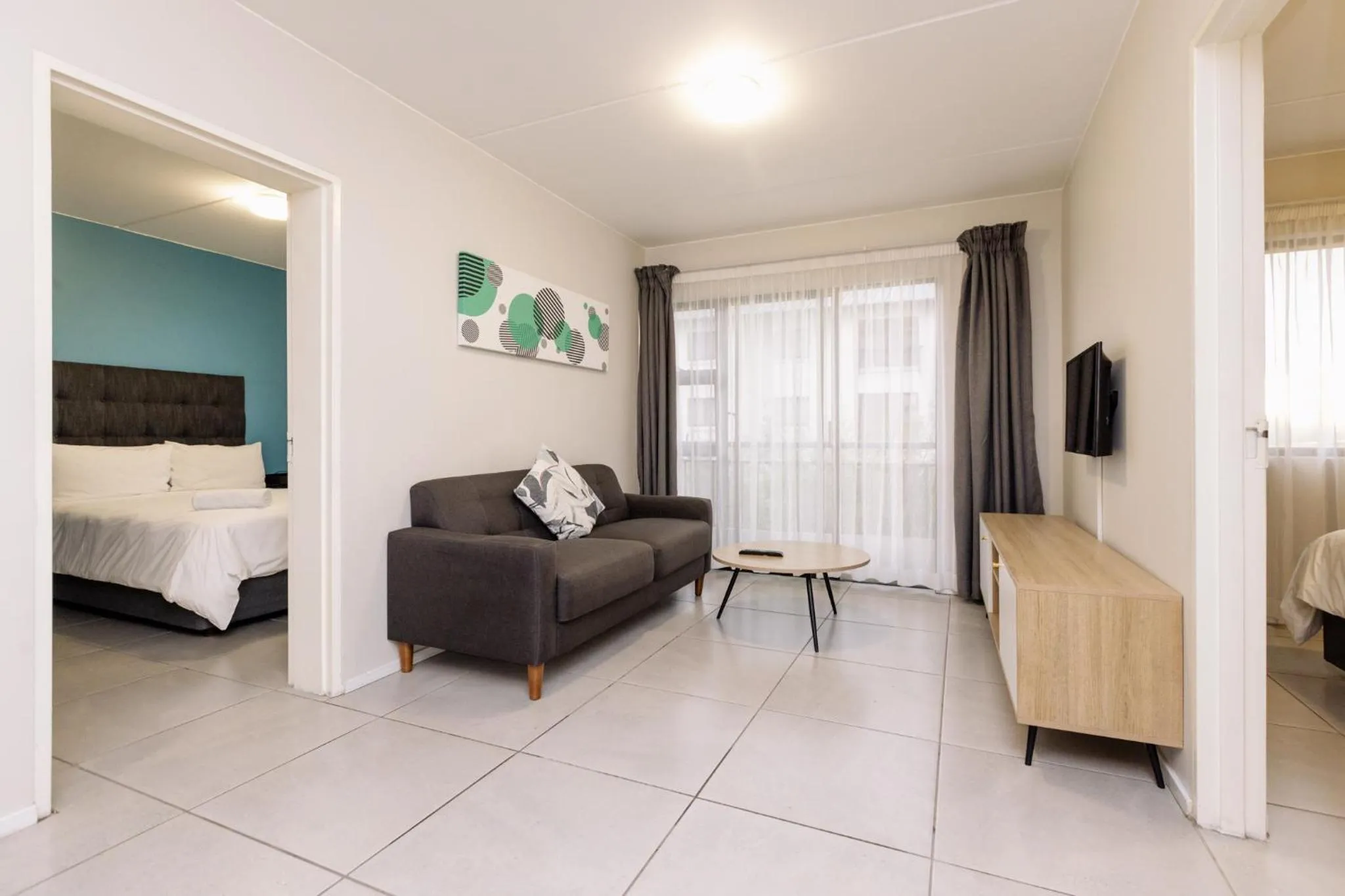 Living room, Bed in MINT Express Sandton View