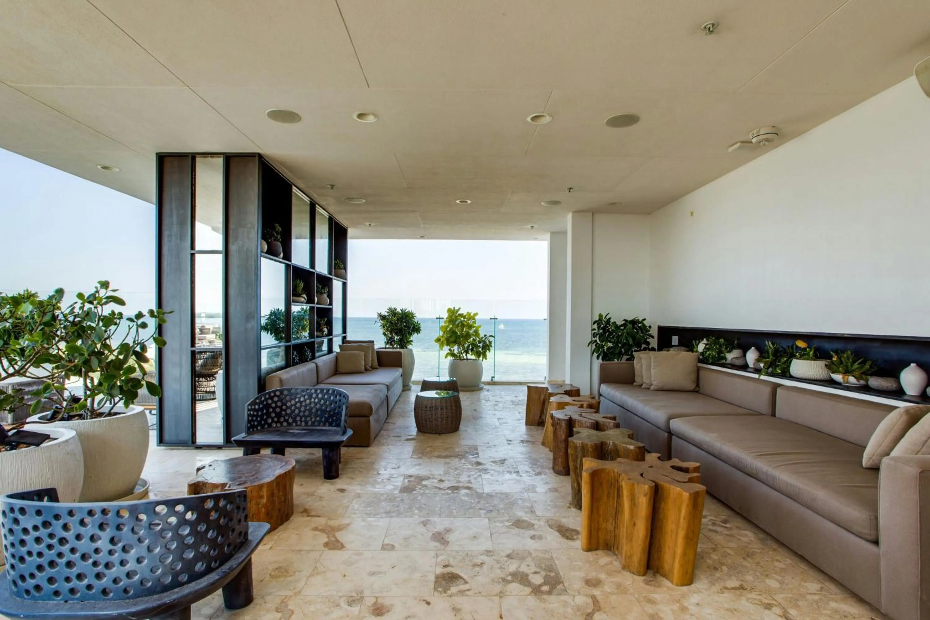 Lounge or bar in Alaia Belize, Autograph Collection