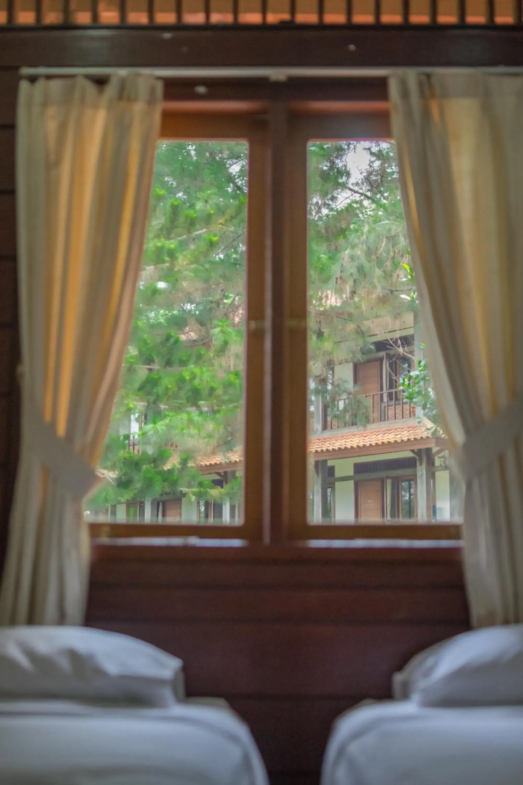 Three-Bedroom Suite Family Room No Air Conditioner ( No AC) in Griya Dunamis by SABDA Three-Bedroom Suite Family Room No Air Conditioner ( No AC) in Griya Dunamis by SABDA