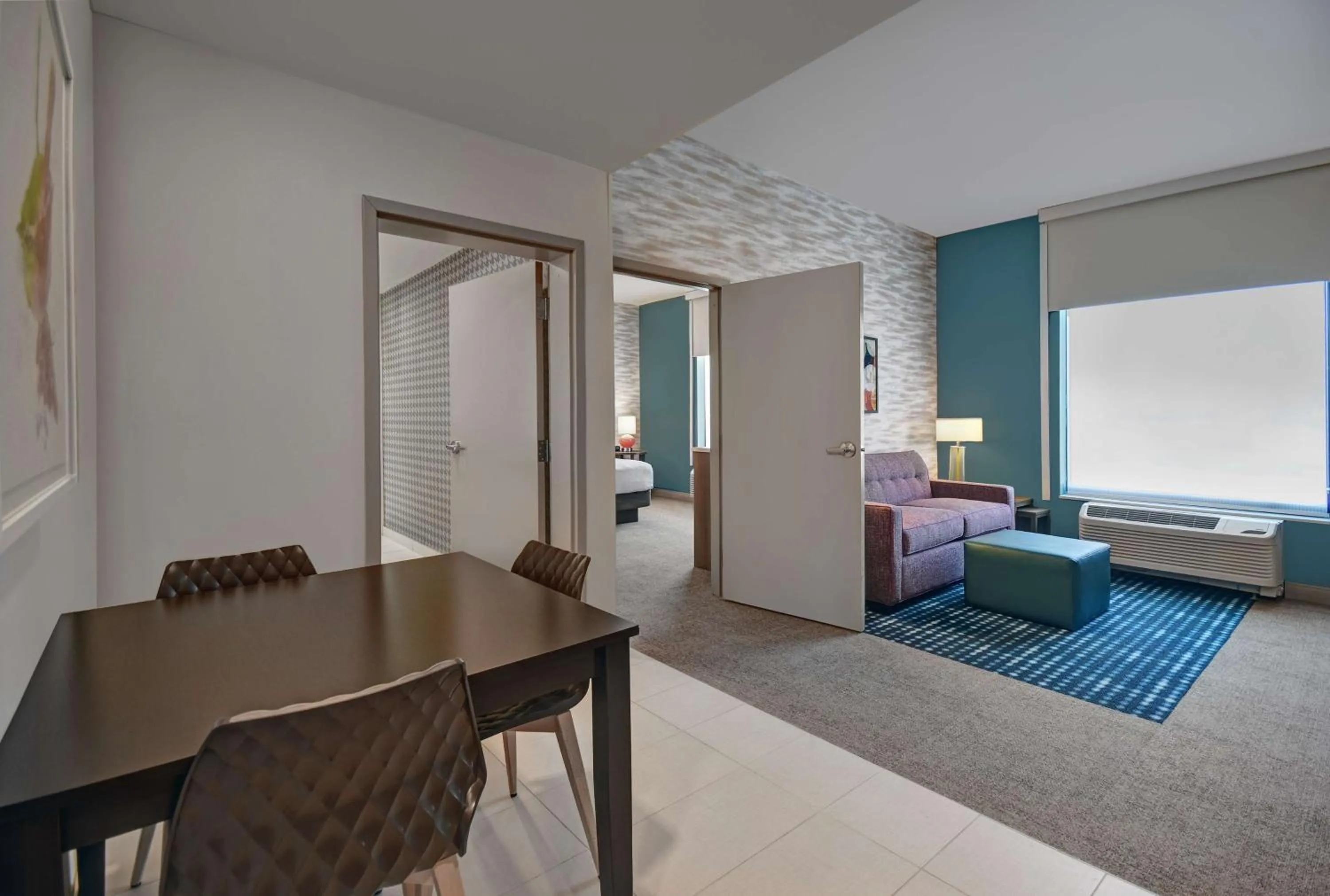 Living room, Bed in Home2 Suites By Hilton Raleigh North I-540