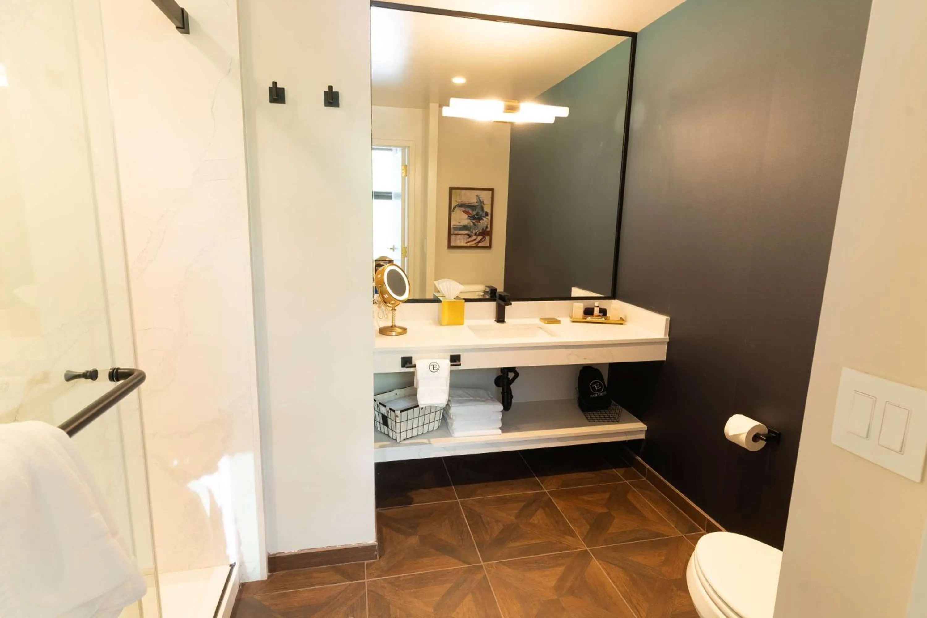 Bathroom in The Exchange Sacramento, Curio Collection By Hilton