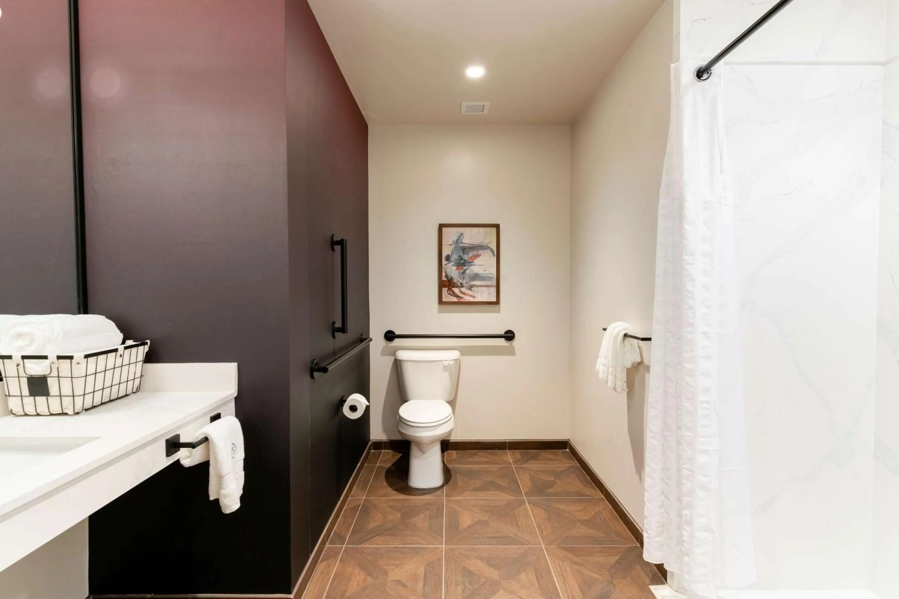 Bathroom in The Exchange Sacramento, Curio Collection By Hilton