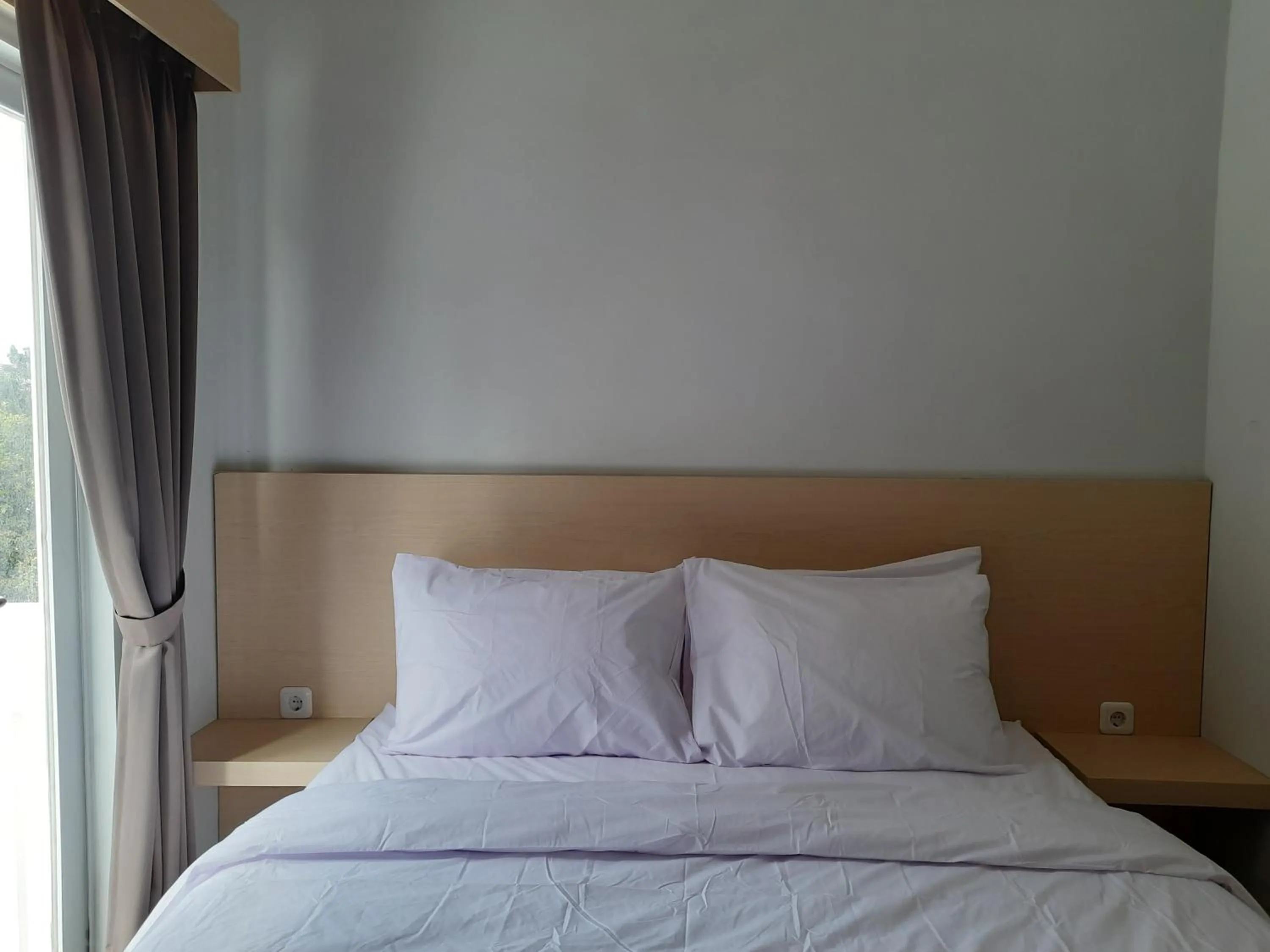 Bed in Mahakam24 Residence