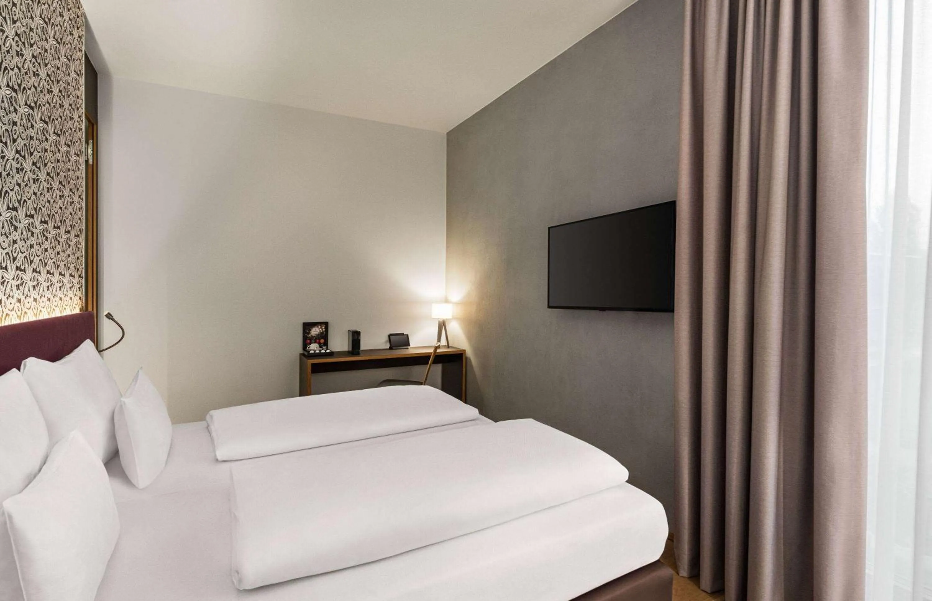 Photo of the whole room, Bed in Amedia Lustenau, Trademark Collection by Wyndham