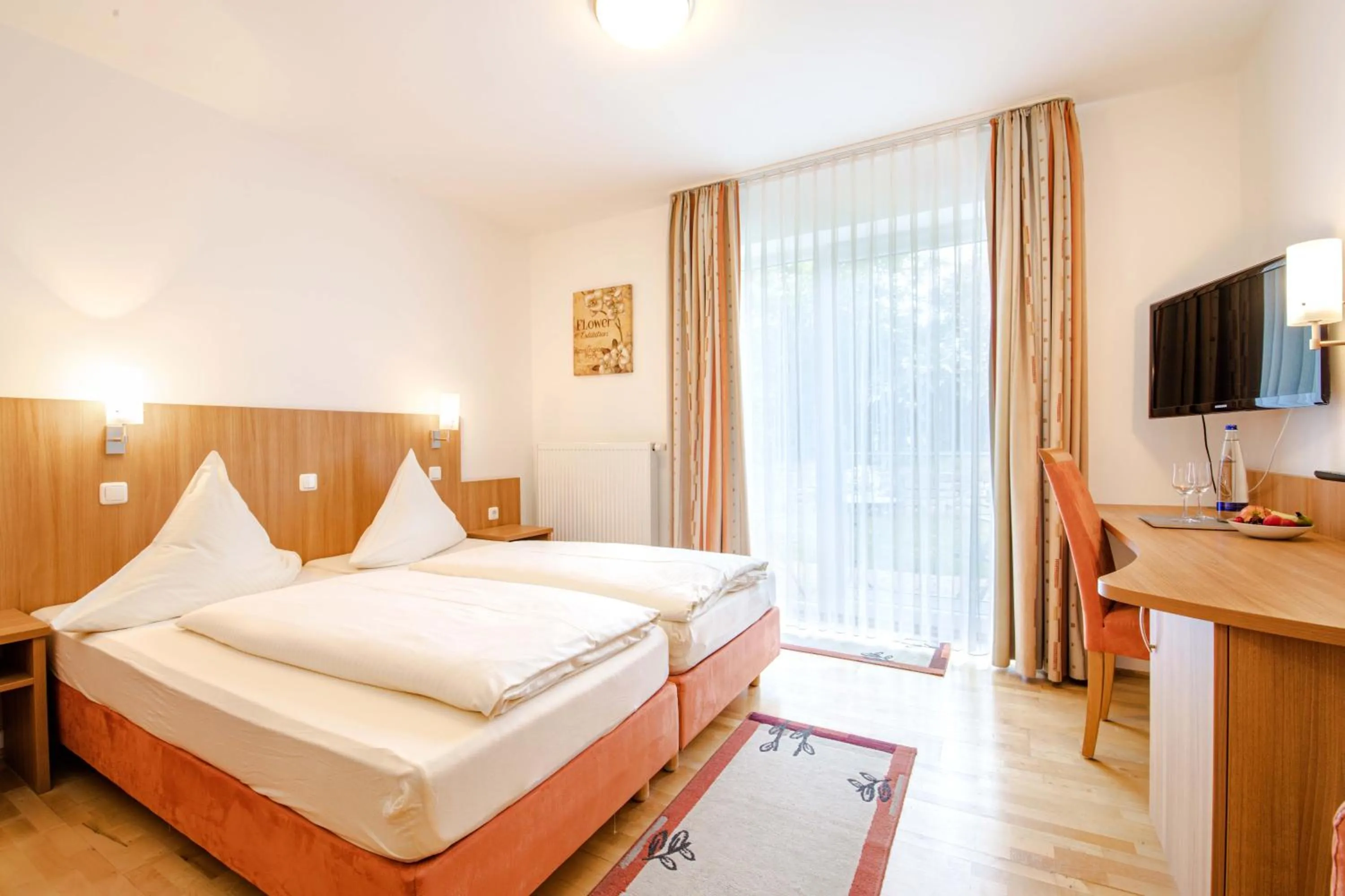 Photo of the whole room, Bed in Gasthaus Hotel Ostermeier