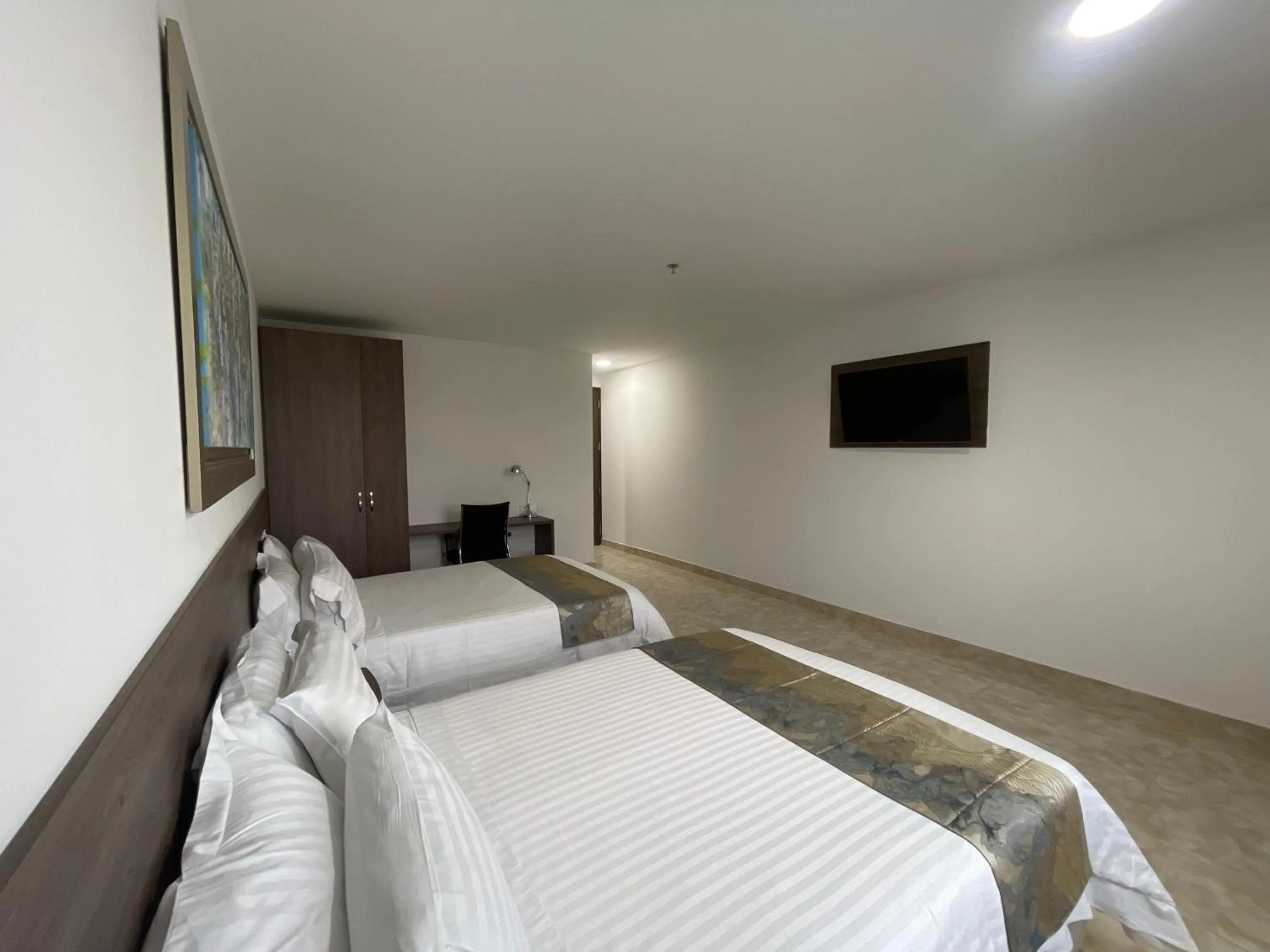 Bed in Hotel Real Elim International