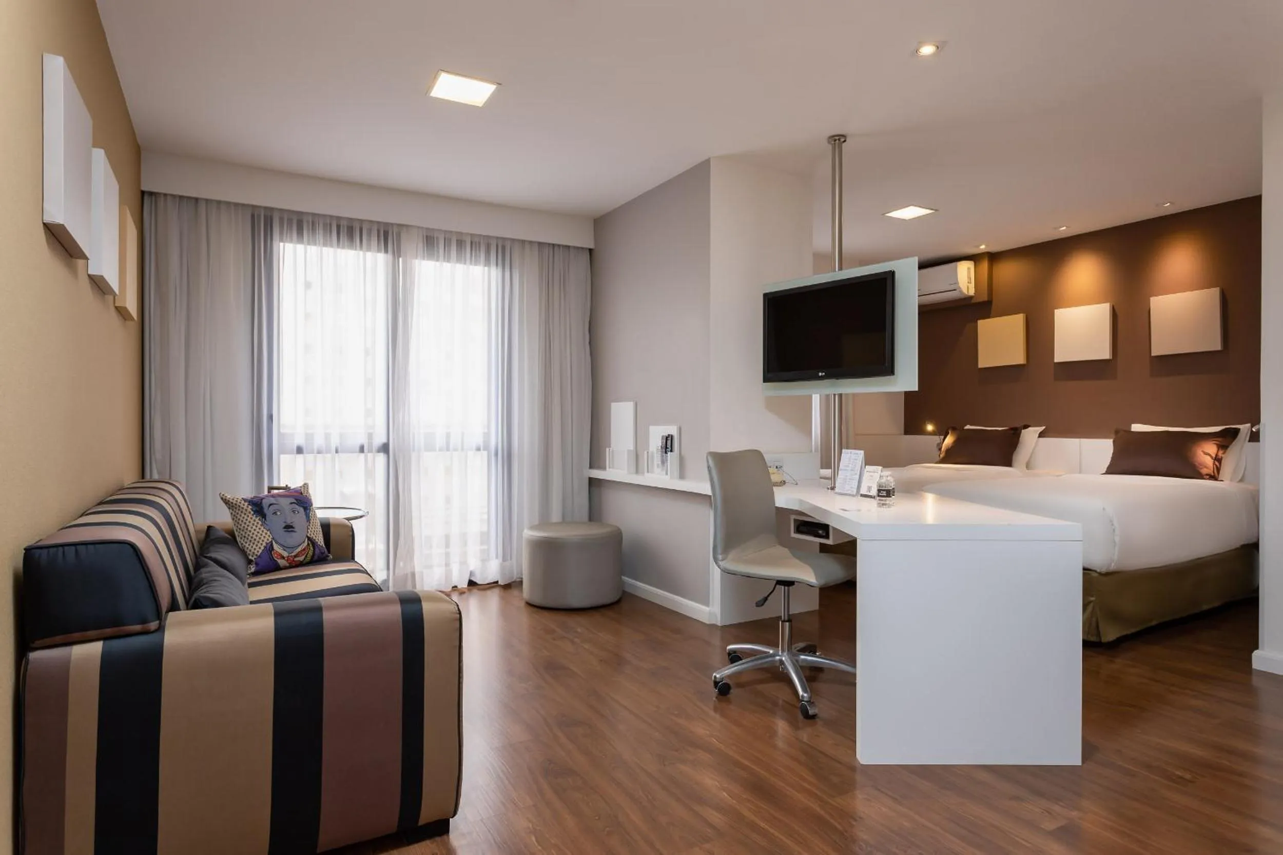 Bed in Paulista Suites by Charlie