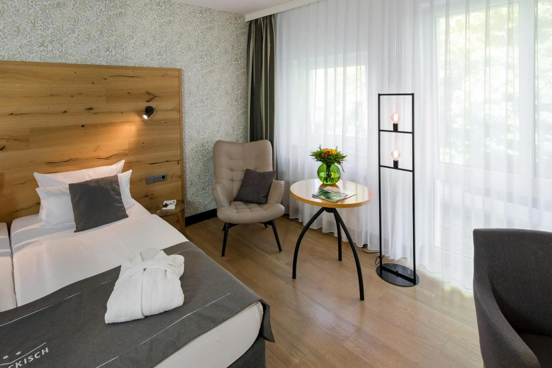 Living room, Bed in Hotel Nickisch