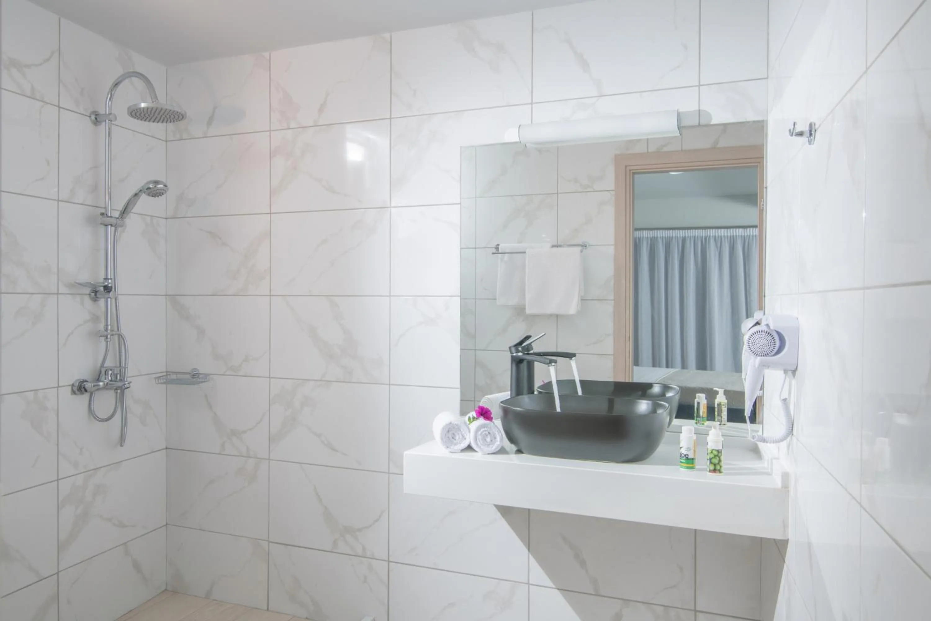 Bathroom in Golden Sunlight Hotel by Estia