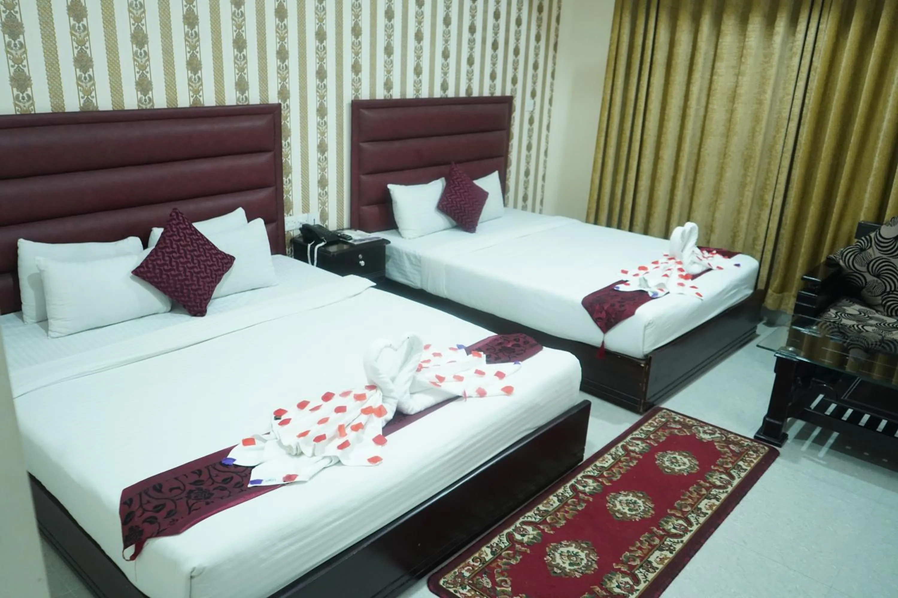 Bed in Grand Mostafa Hotel Ababil