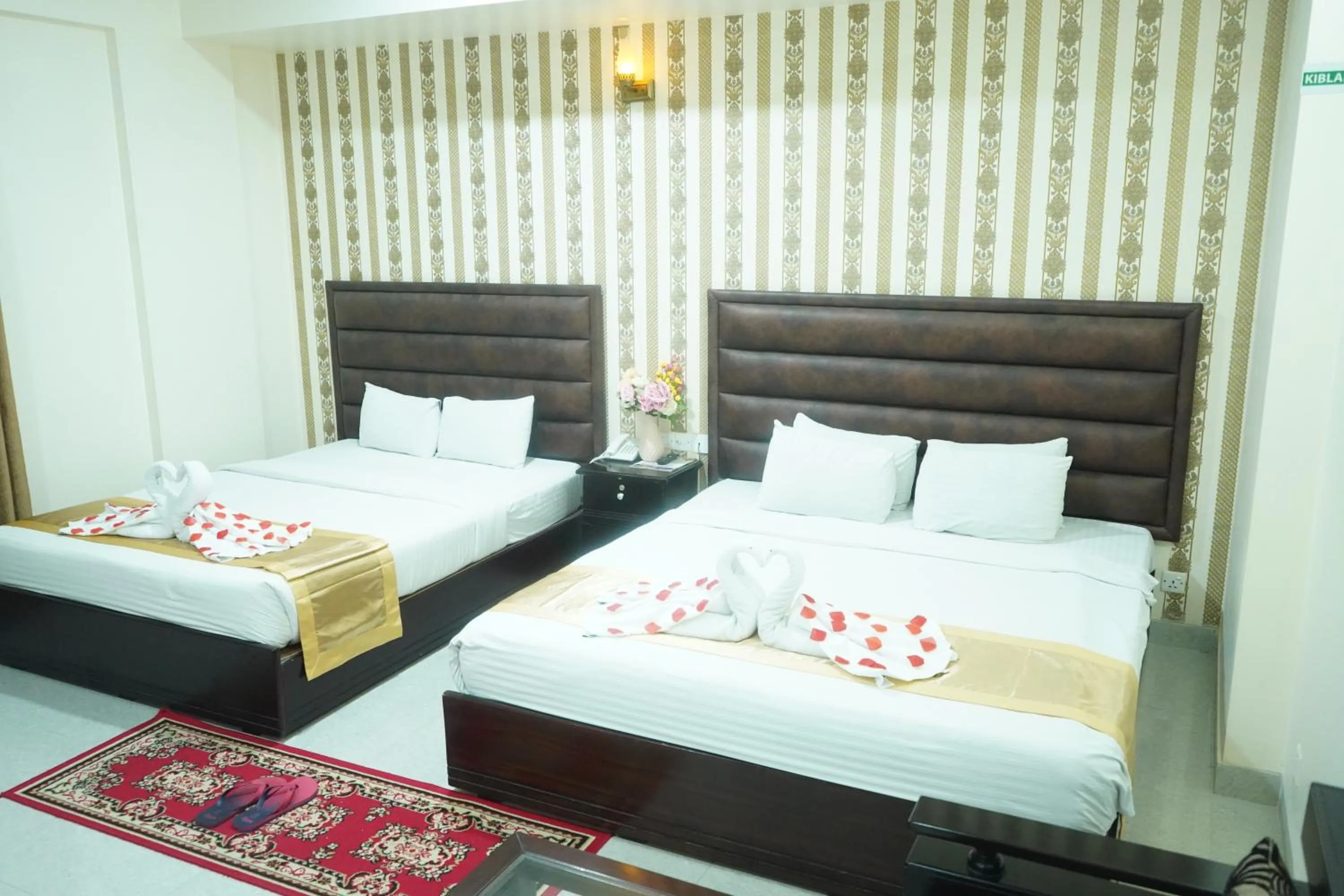 Bed in Grand Mostafa Hotel Ababil