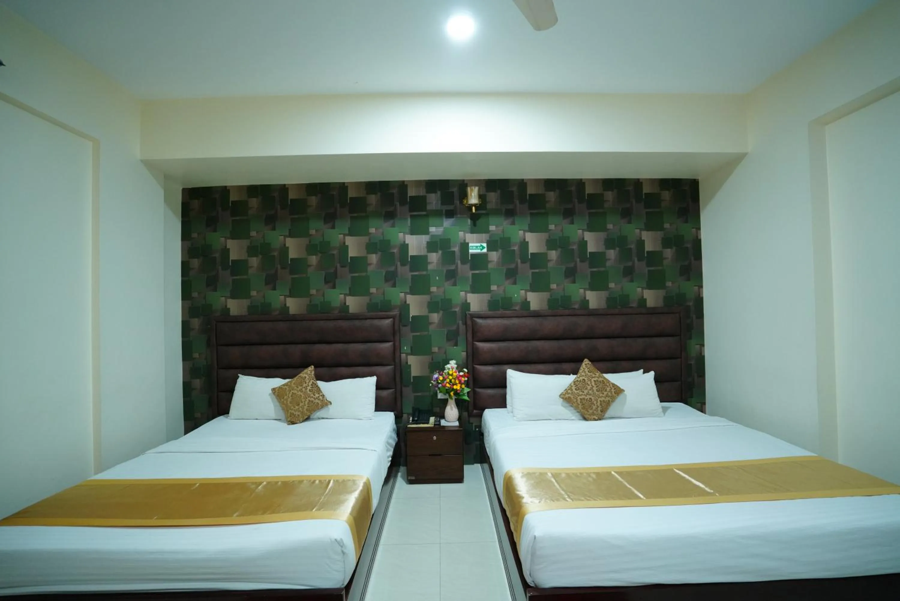 Bed in Grand Mostafa Hotel Ababil