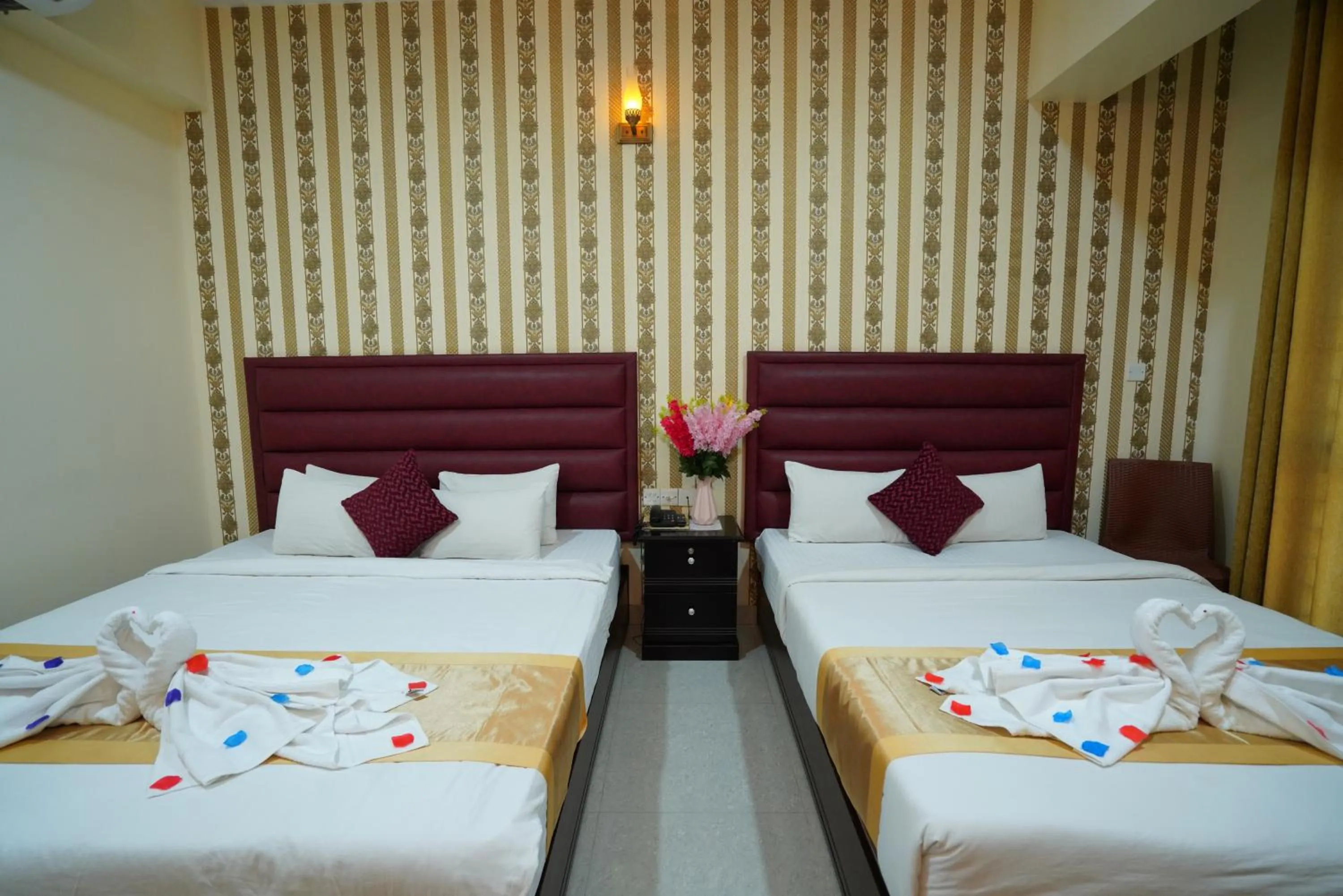 Bed in Grand Mostafa Hotel Ababil