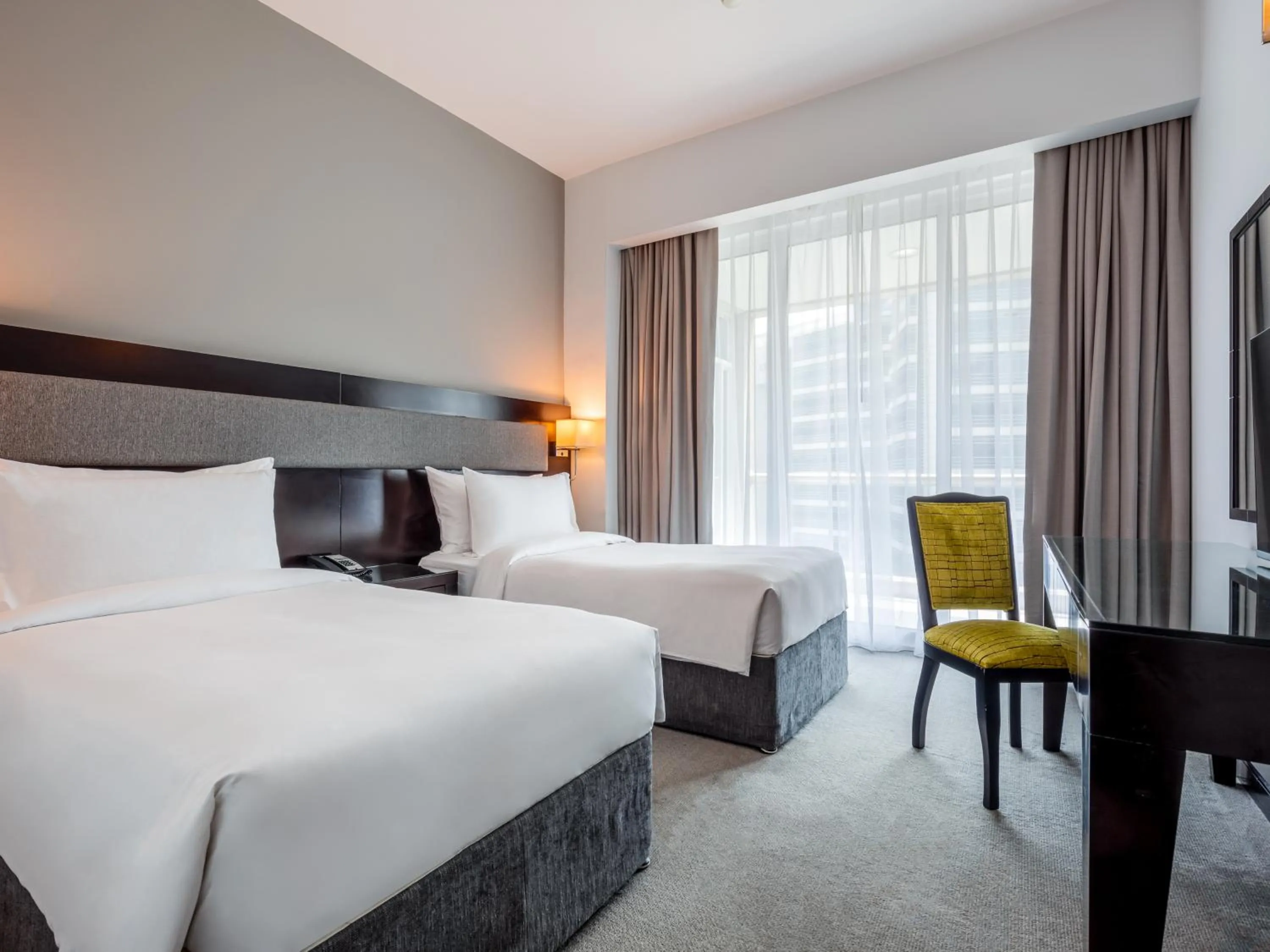 Bed in Flora Creek Deluxe Hotel Apartments, Dubai