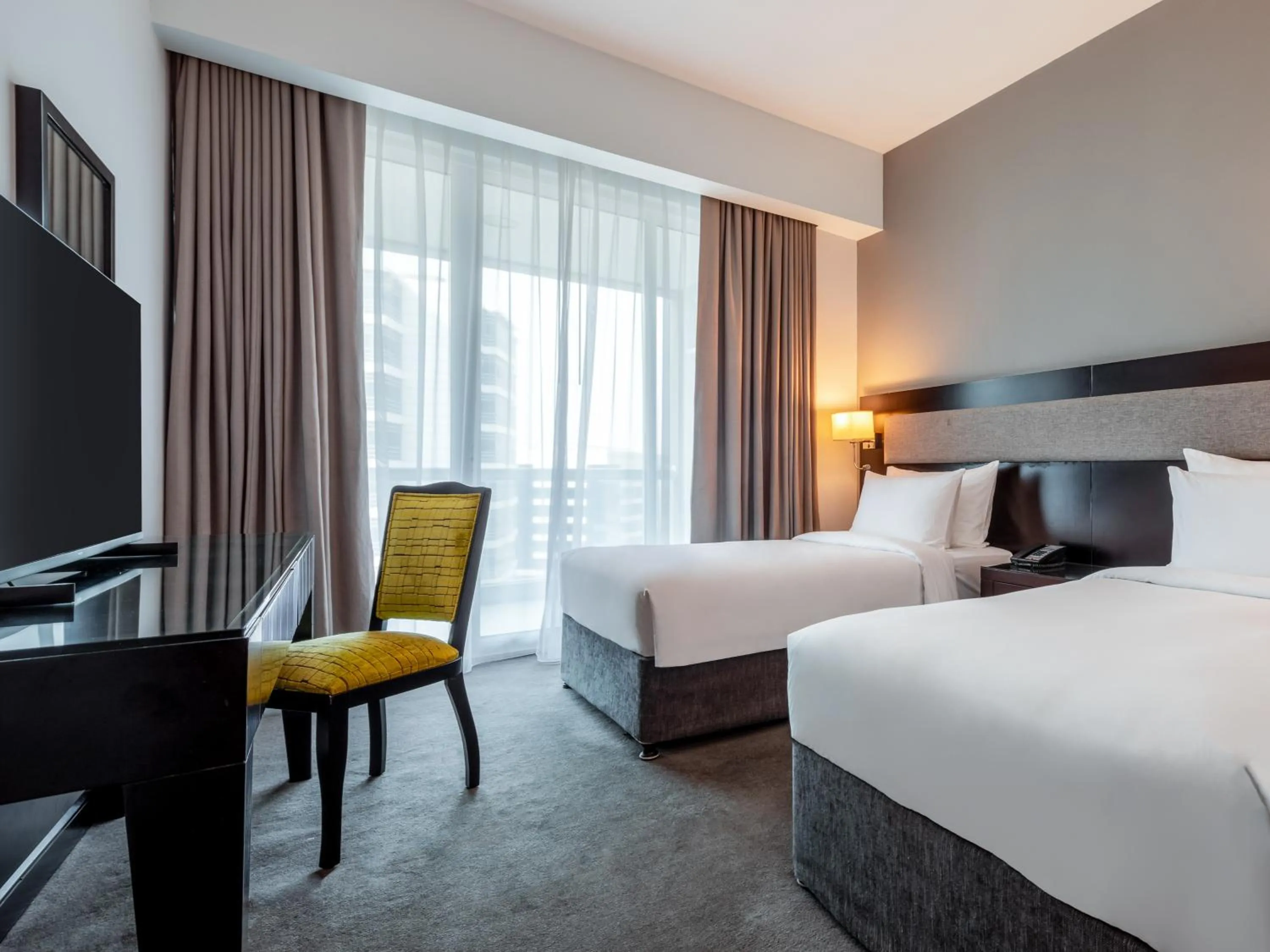 Bed in Flora Creek Deluxe Hotel Apartments, Dubai