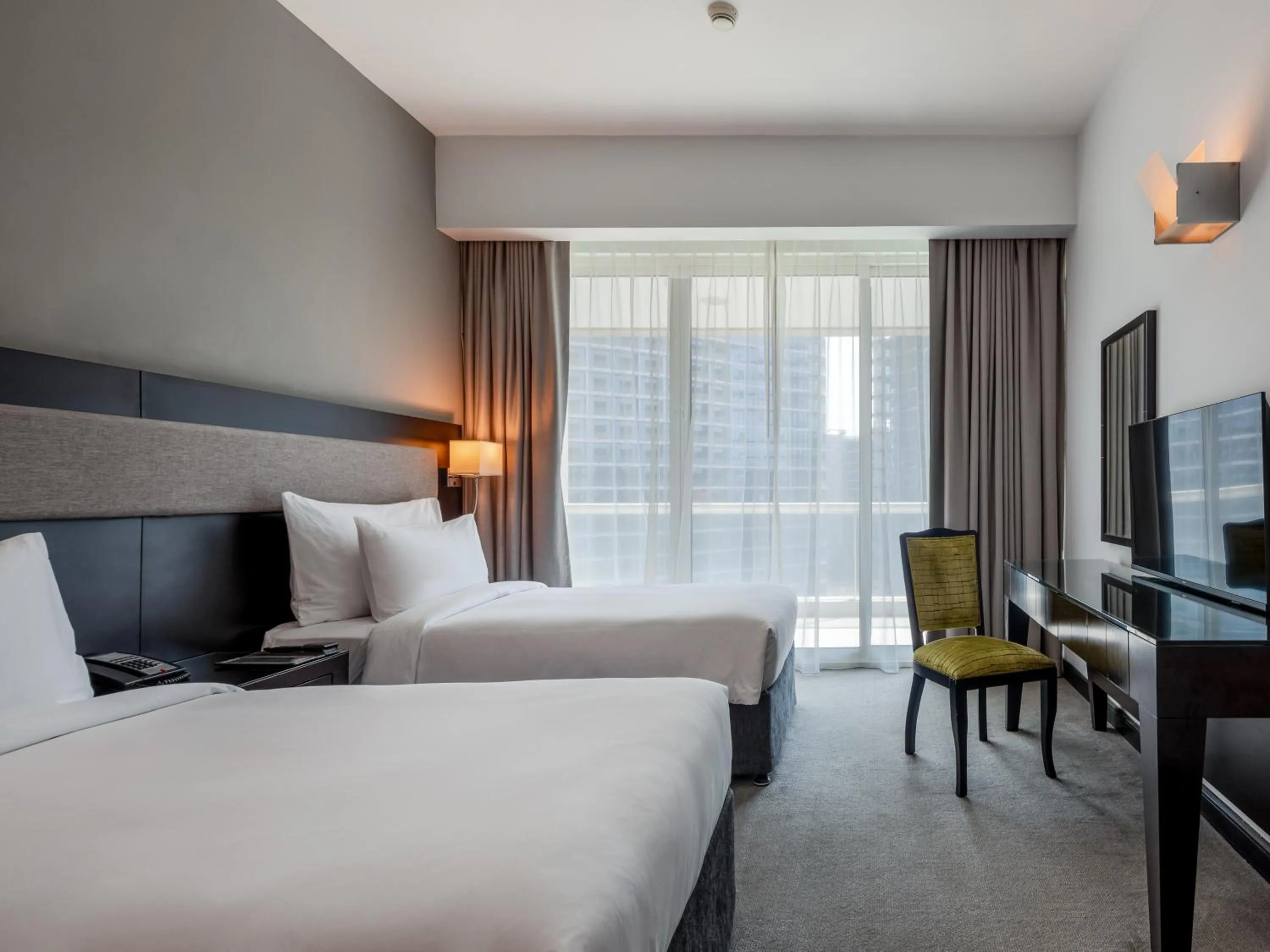 Bed in Flora Creek Deluxe Hotel Apartments, Dubai