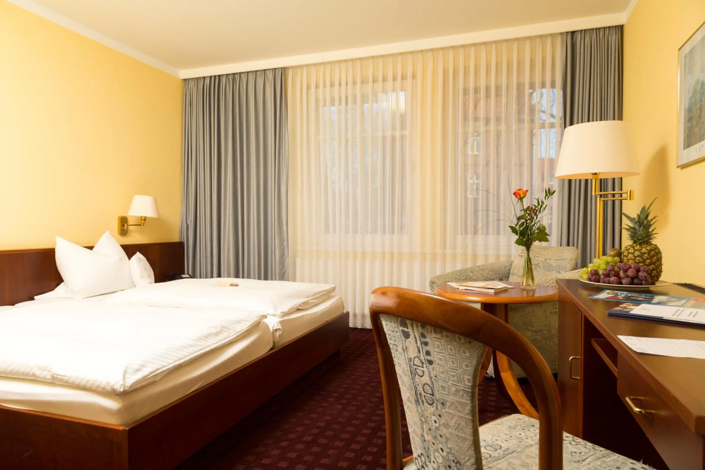 Photo of the whole room, Bed in Ringhotel Residenz Wittmund