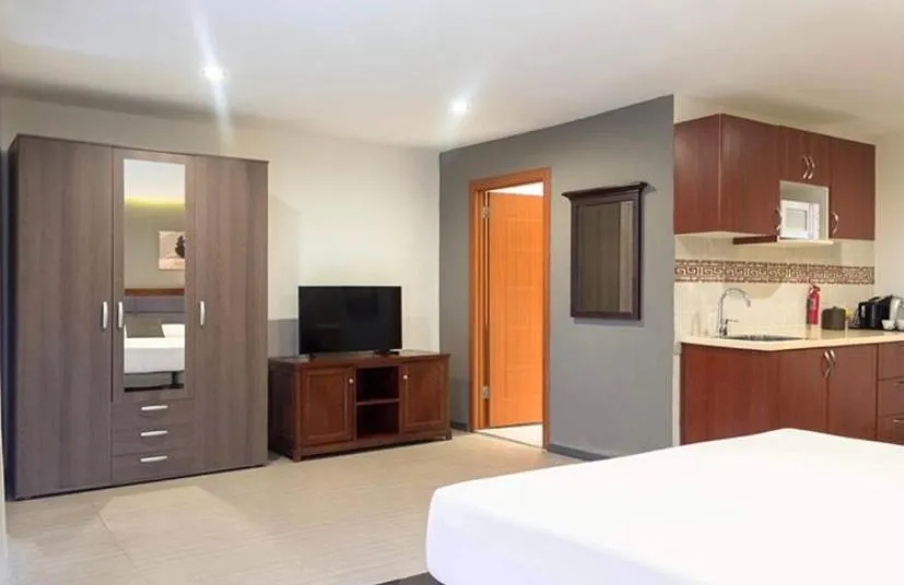 Bed in Curacao Suites Hotel