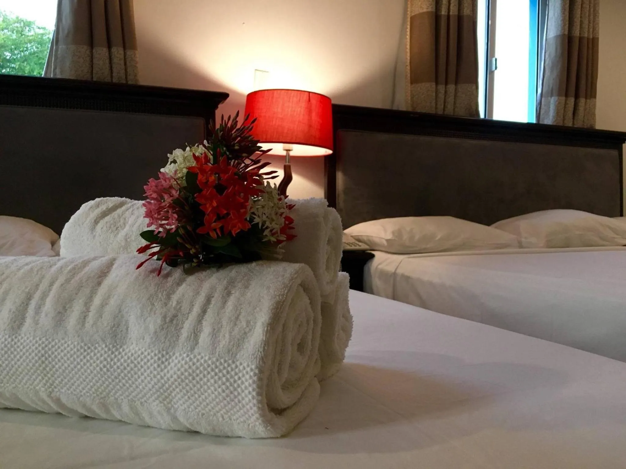 Bed in Curacao Suites Hotel