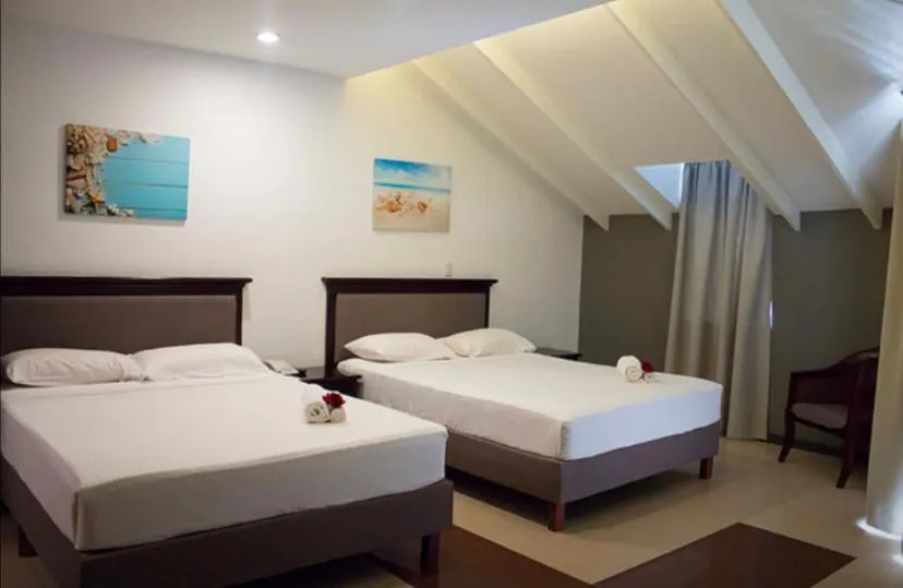 Bed in Curacao Suites Hotel